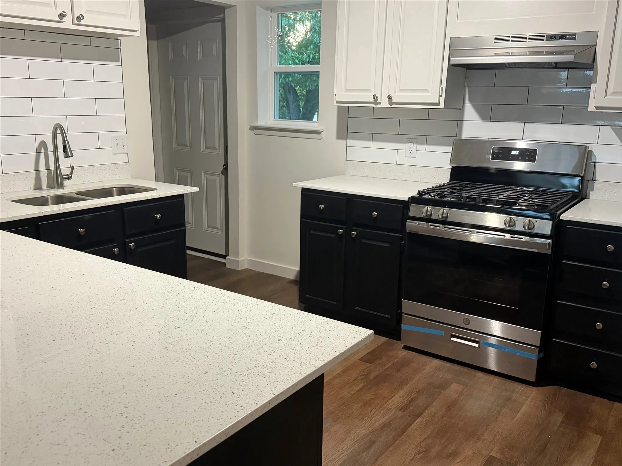 New dishwasher, stove, garbage disposal