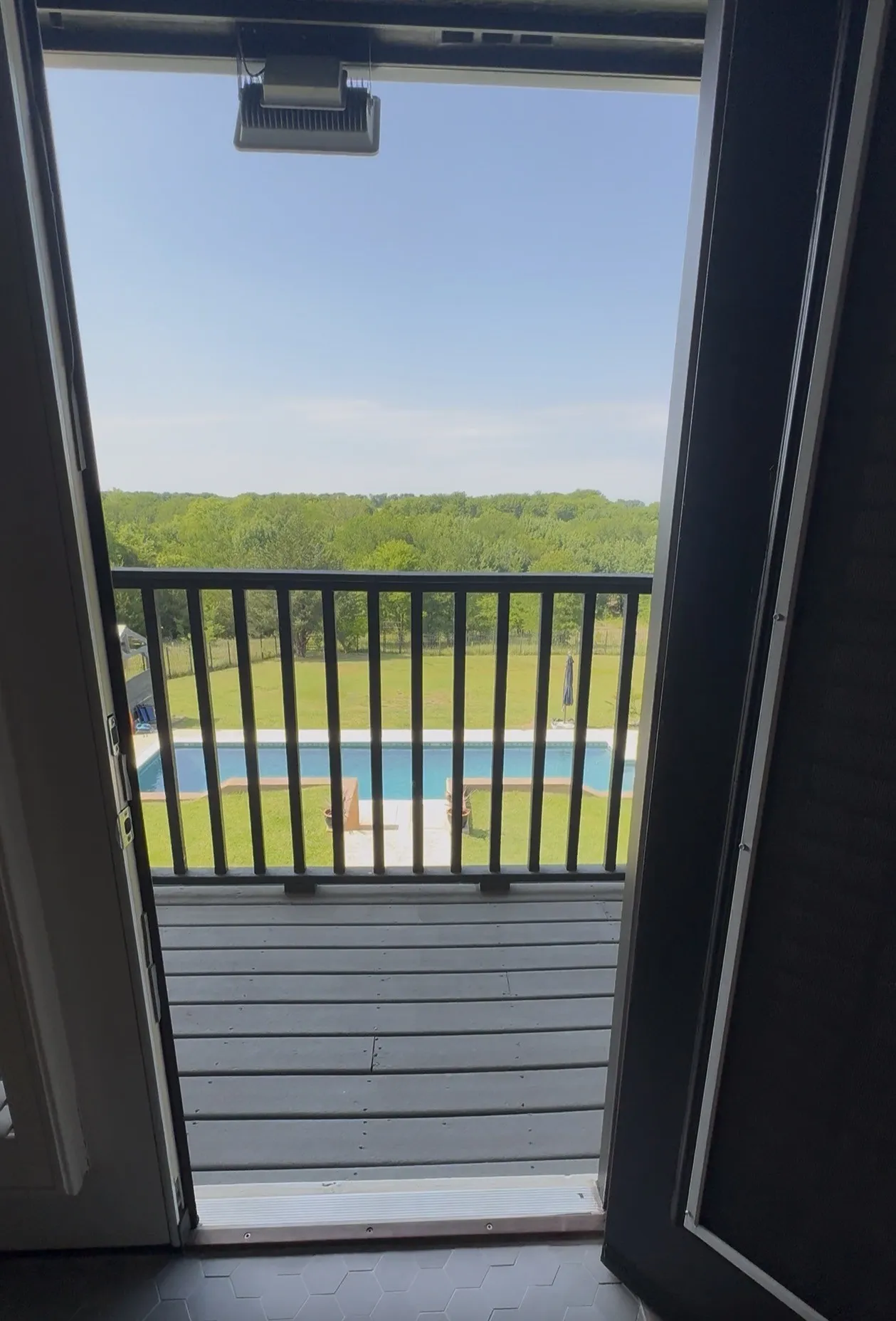 Step onto the balcony from the primary bedroom to enjoy gorgeous views.