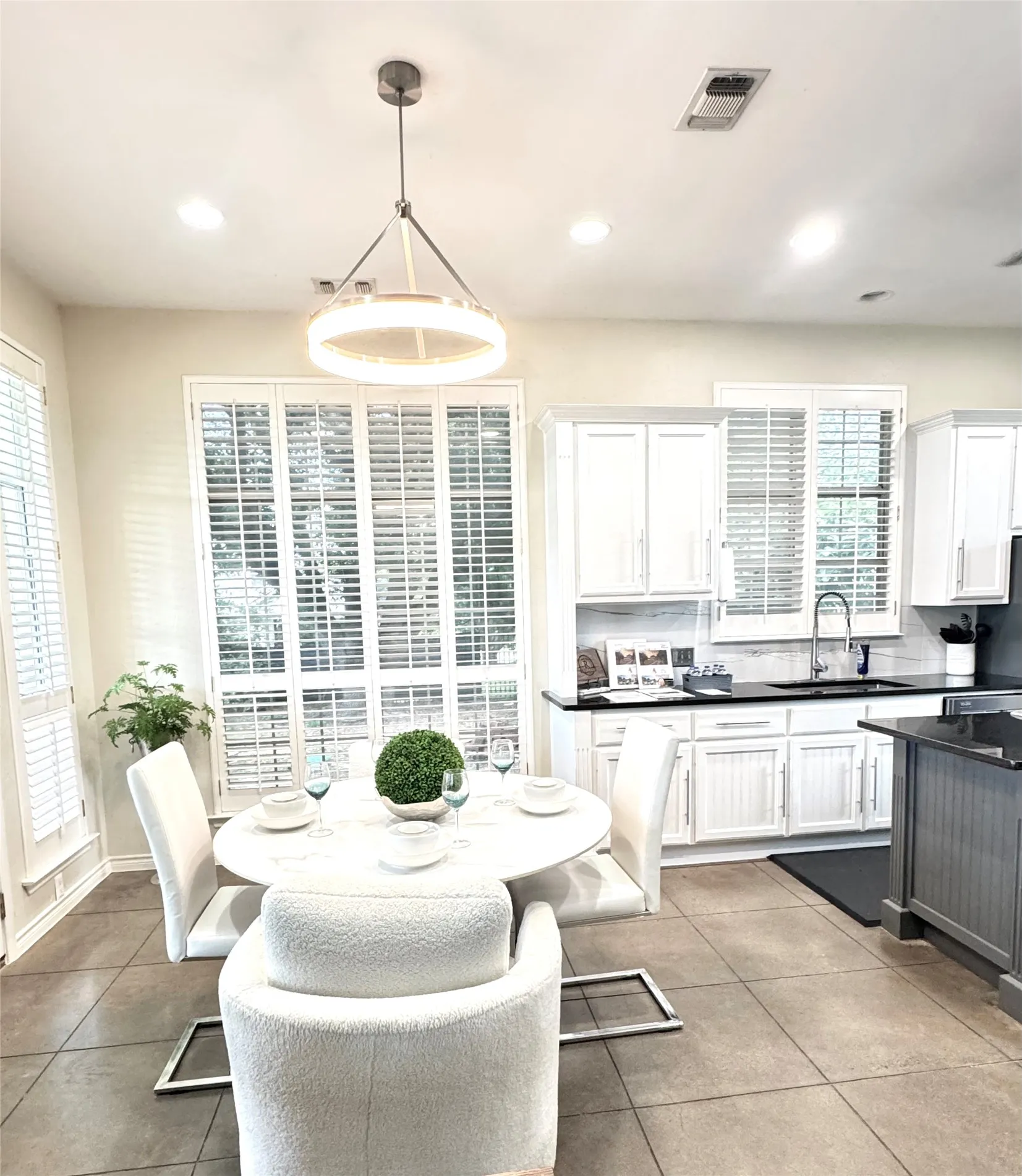 The kitchen features new fixtures, lighting and a fan!