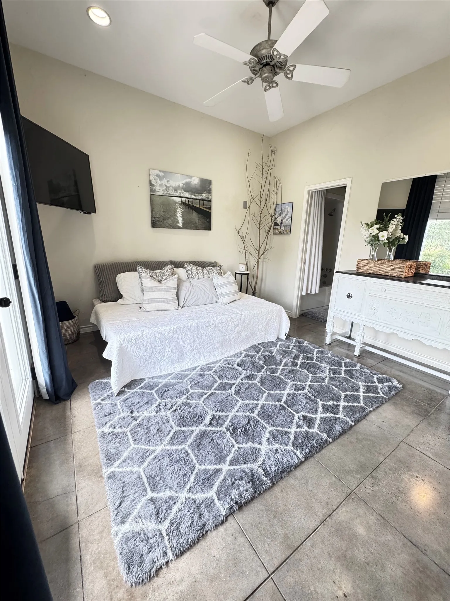Downstairs features a bedroom and full bath.