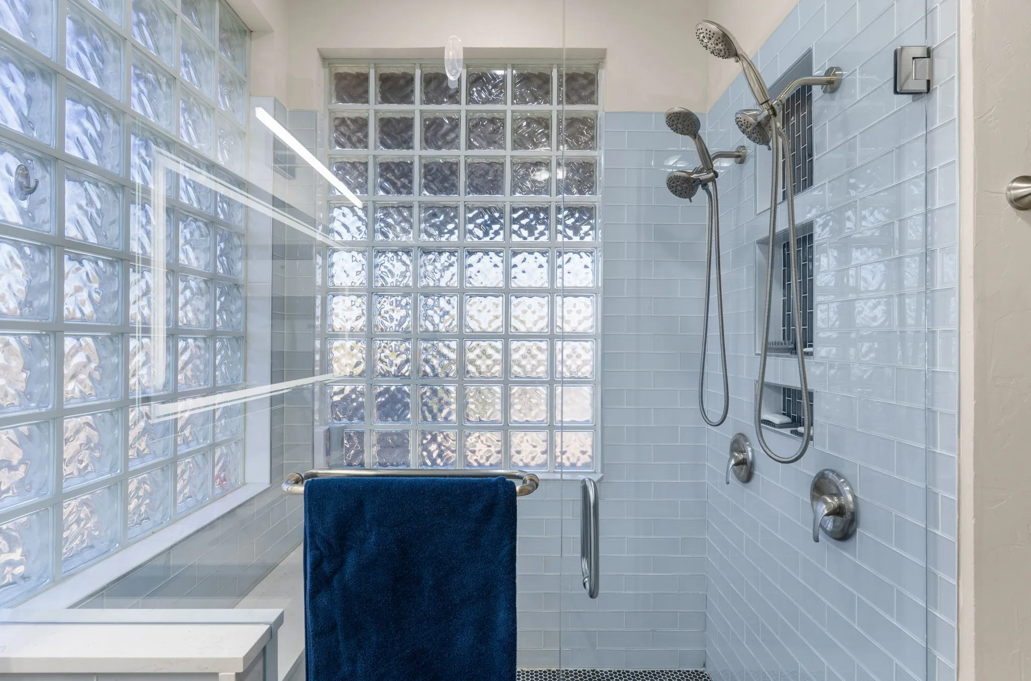The primary bathroom features dual sinks and a spacious walk-in shower!