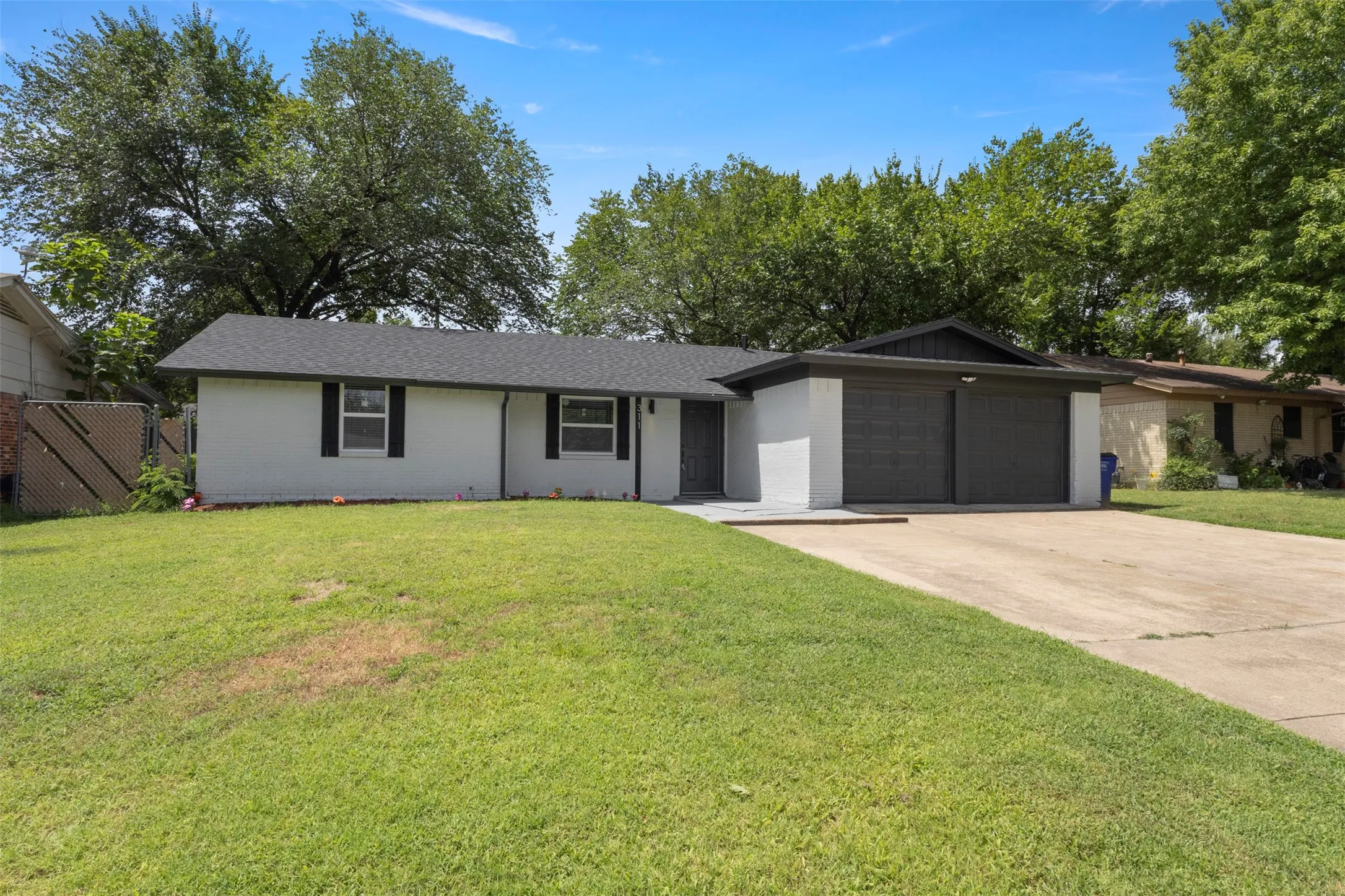 Frontal view of the home and driveway