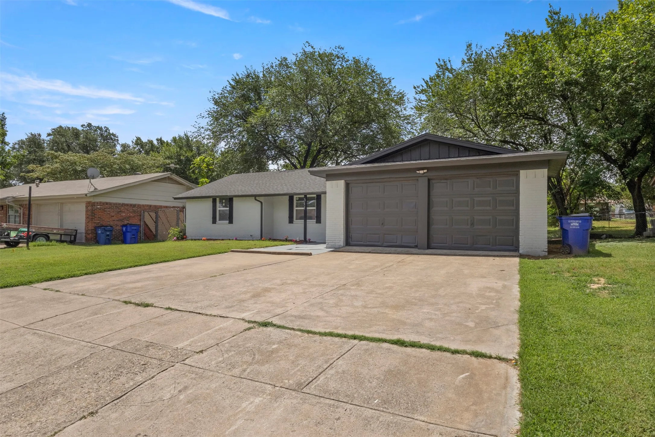 Frontal view of the home and driveway