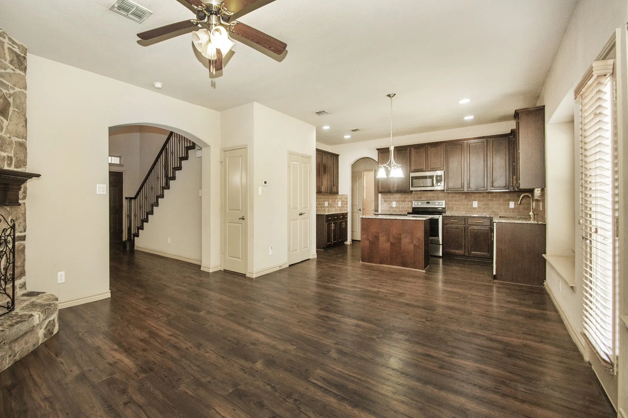 Kitchen view from the Family Room with Fireplace