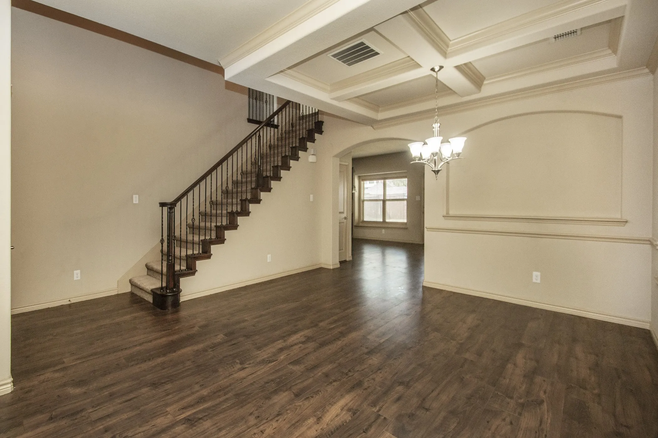 Living, Dining Room with View of Stairs