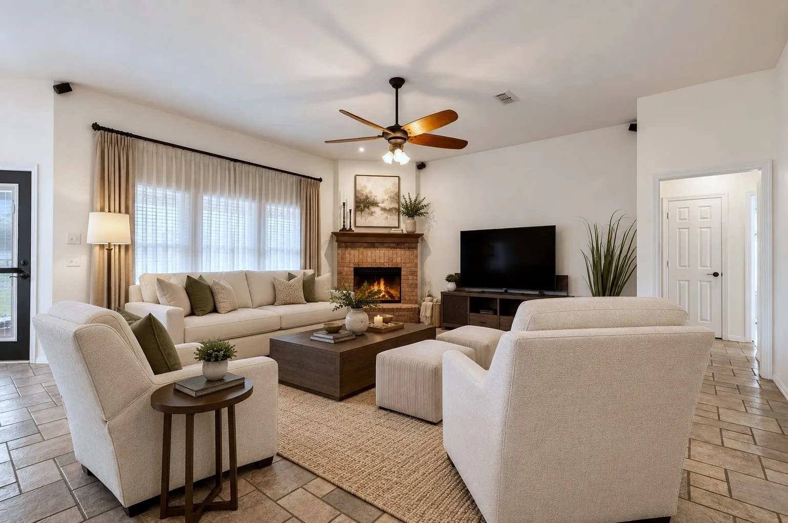 Living Room With Brick Fireplace And Abundant Natural Light