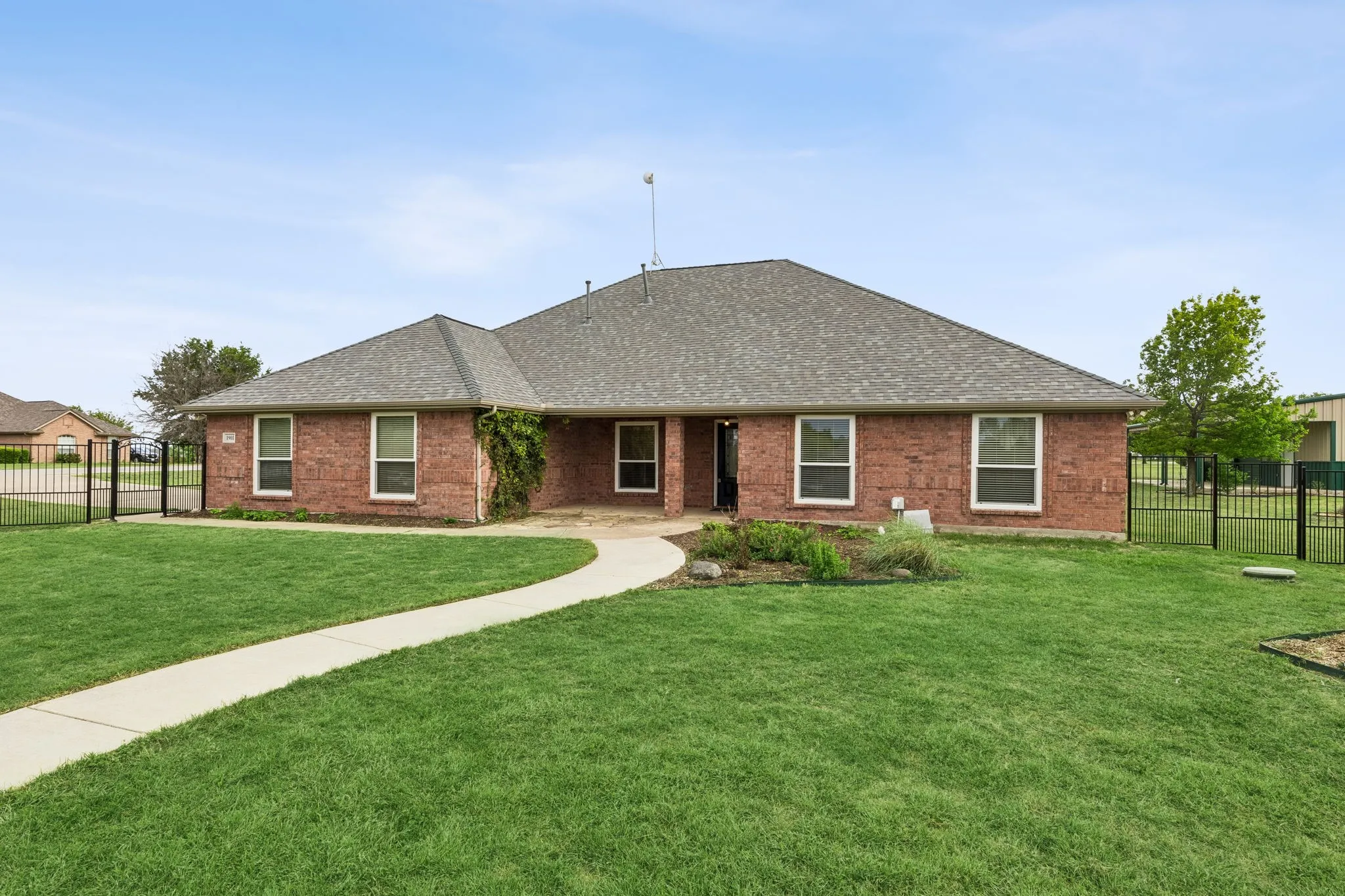 Beautiful Outdoor Setting With Green Space, Gardens, And Sunset Views