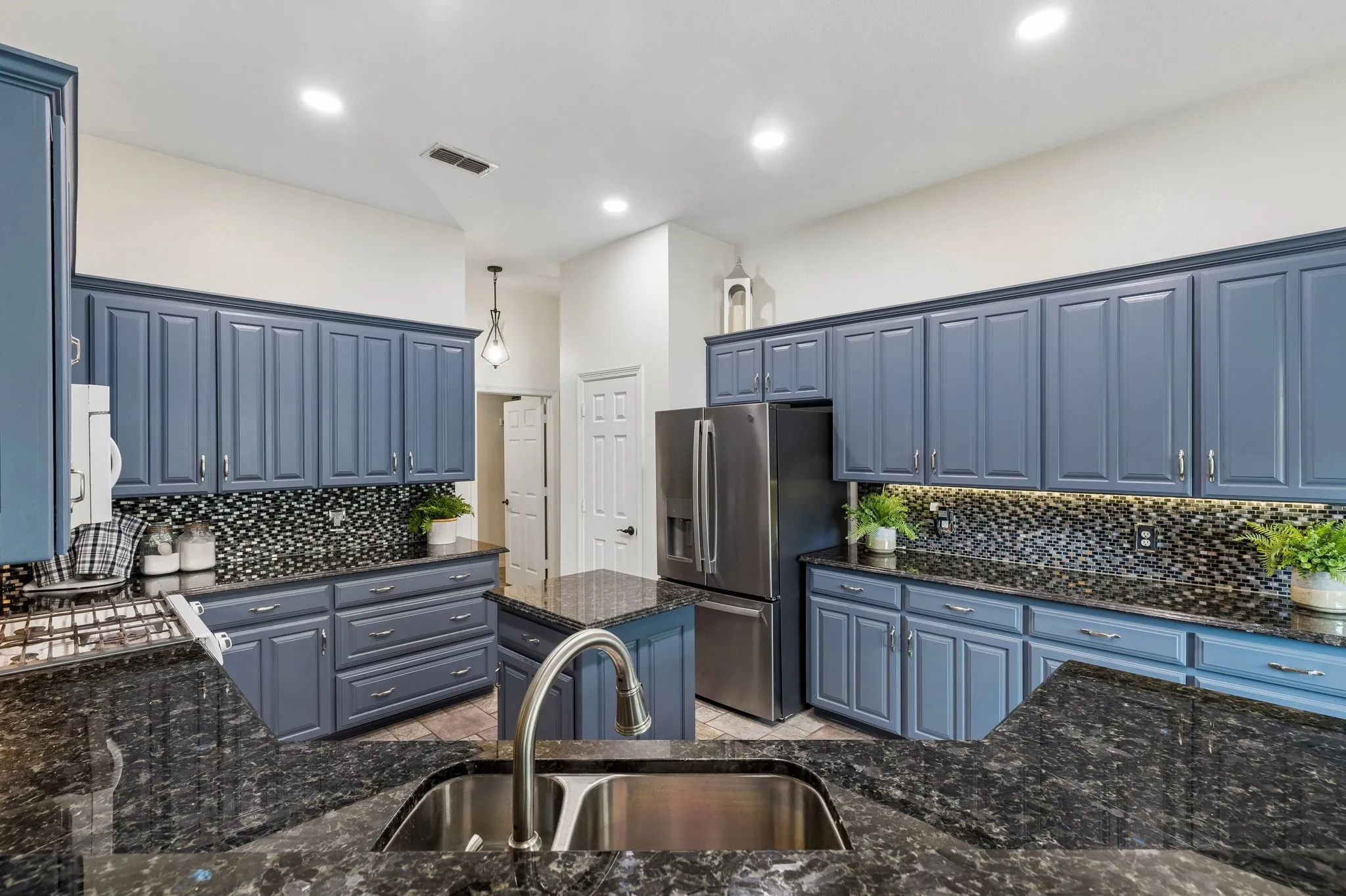 Thoughtful Layout With Center Island, Ample Storage, And Open Flow