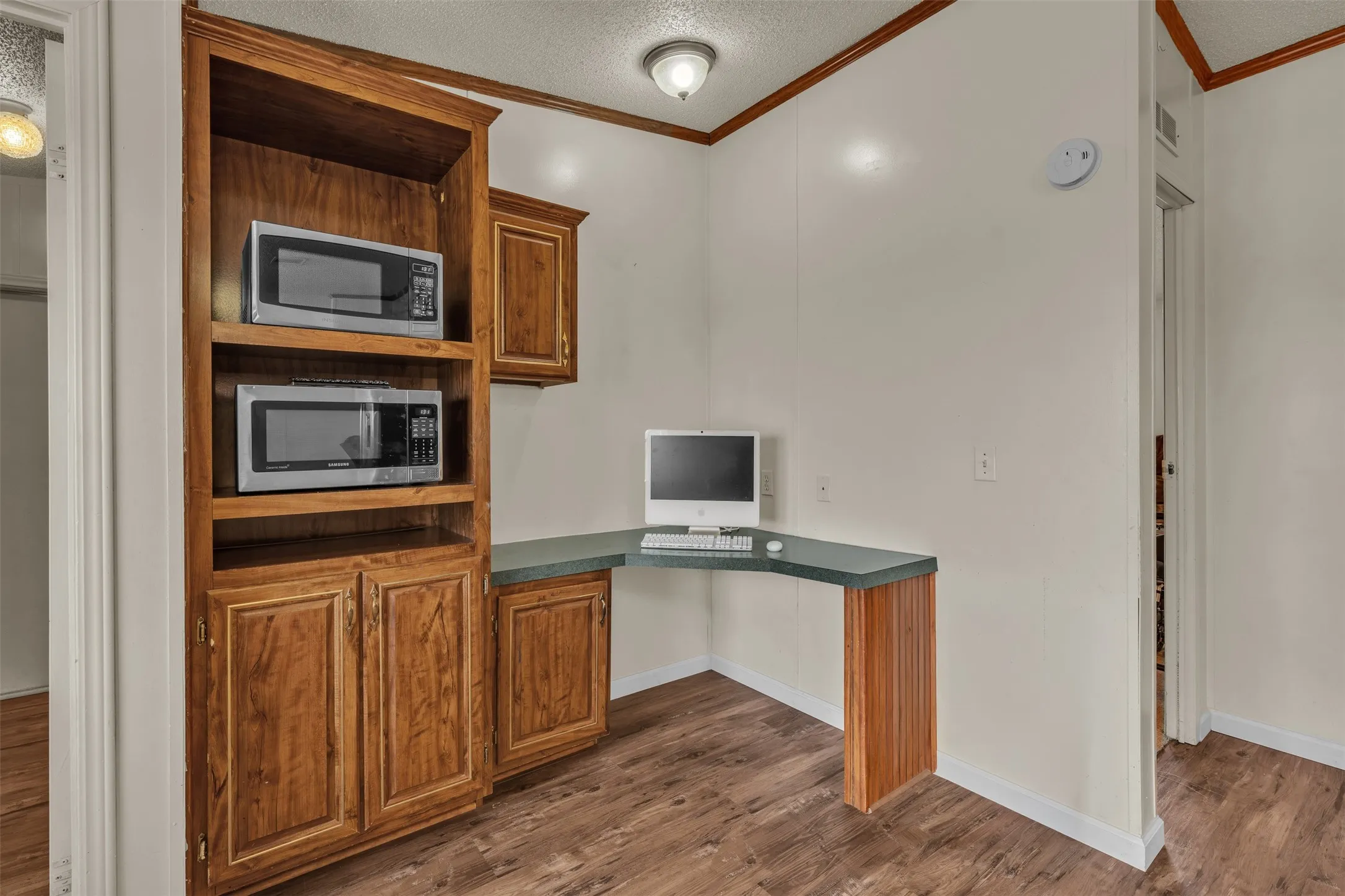 Built in desk in the corner of the kitchen- great for homework!
