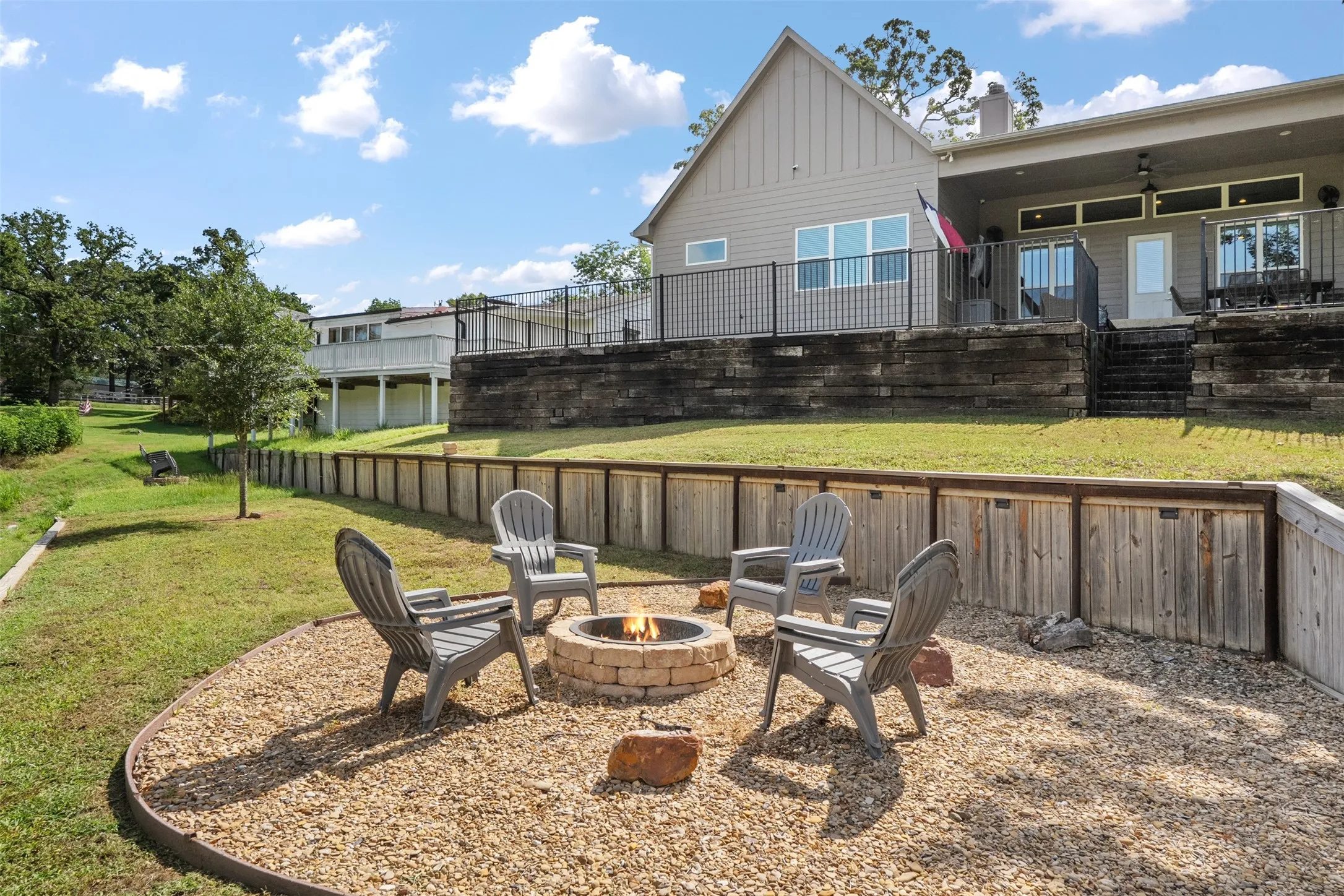 back of home and firepit