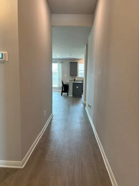 Front door to kitchen and living area