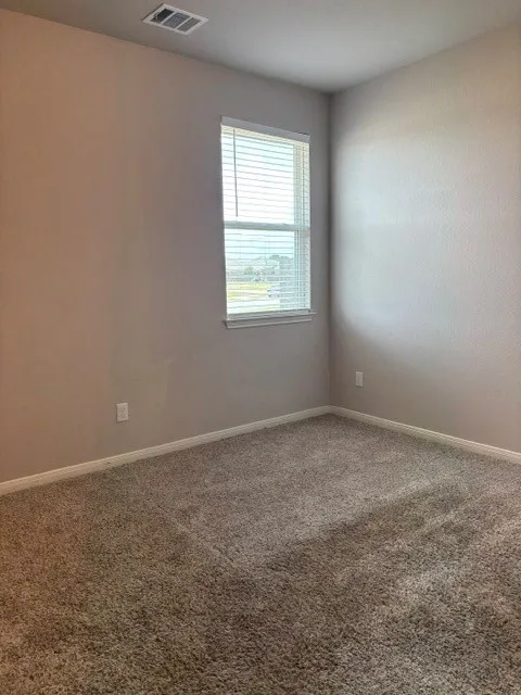 Bedroom #3 with carpet and blinds