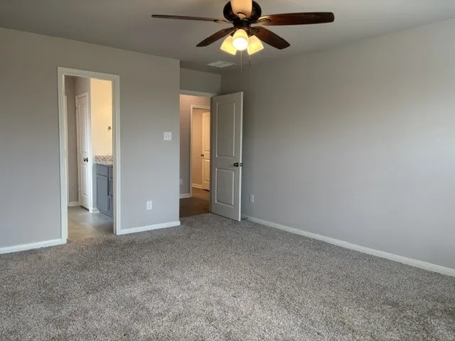 Leading into primary bath and hallway
