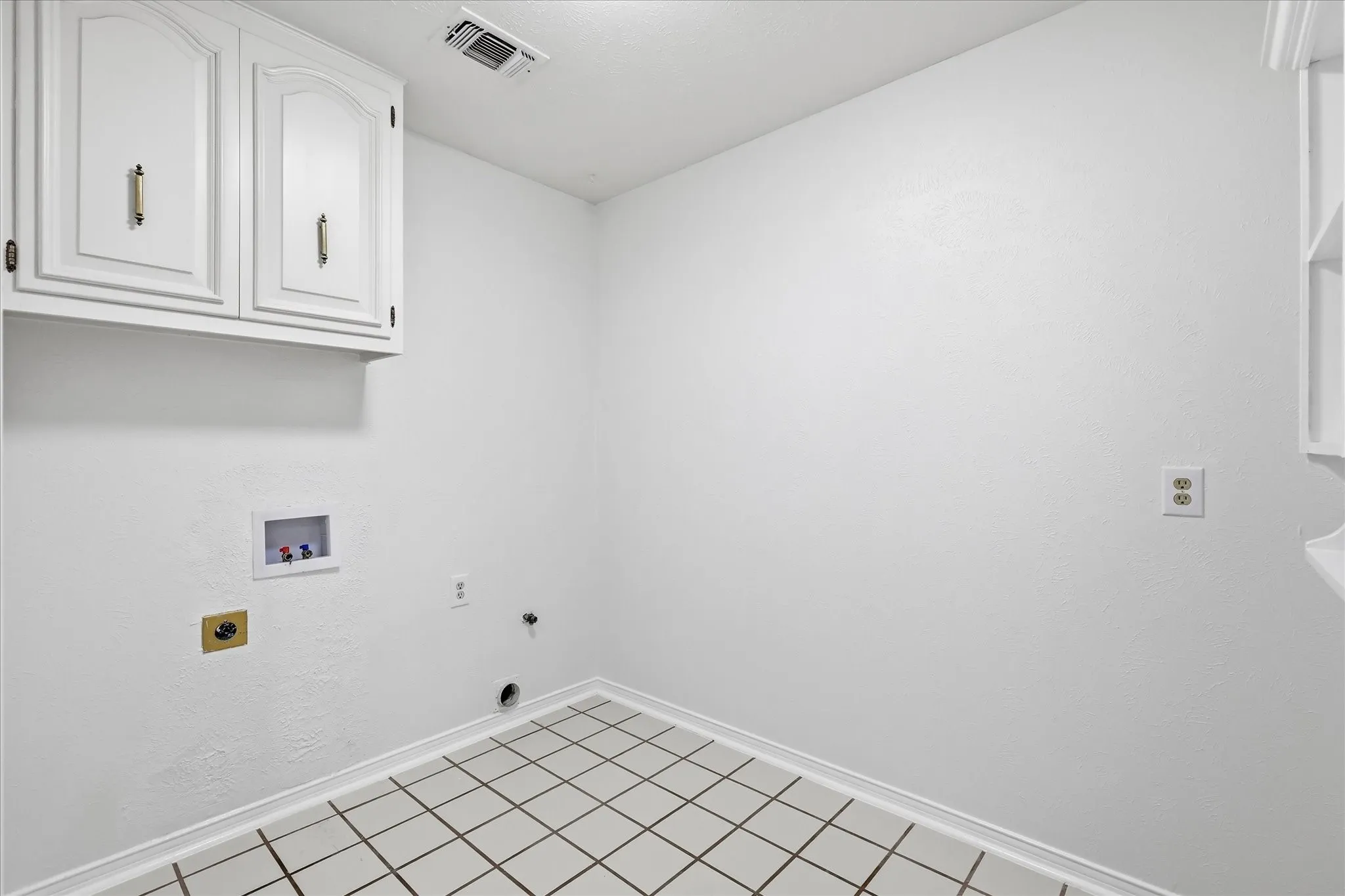 Spacious laundry room with gas or electric connection for dryer. Washer and dryer available for $25 per month each.