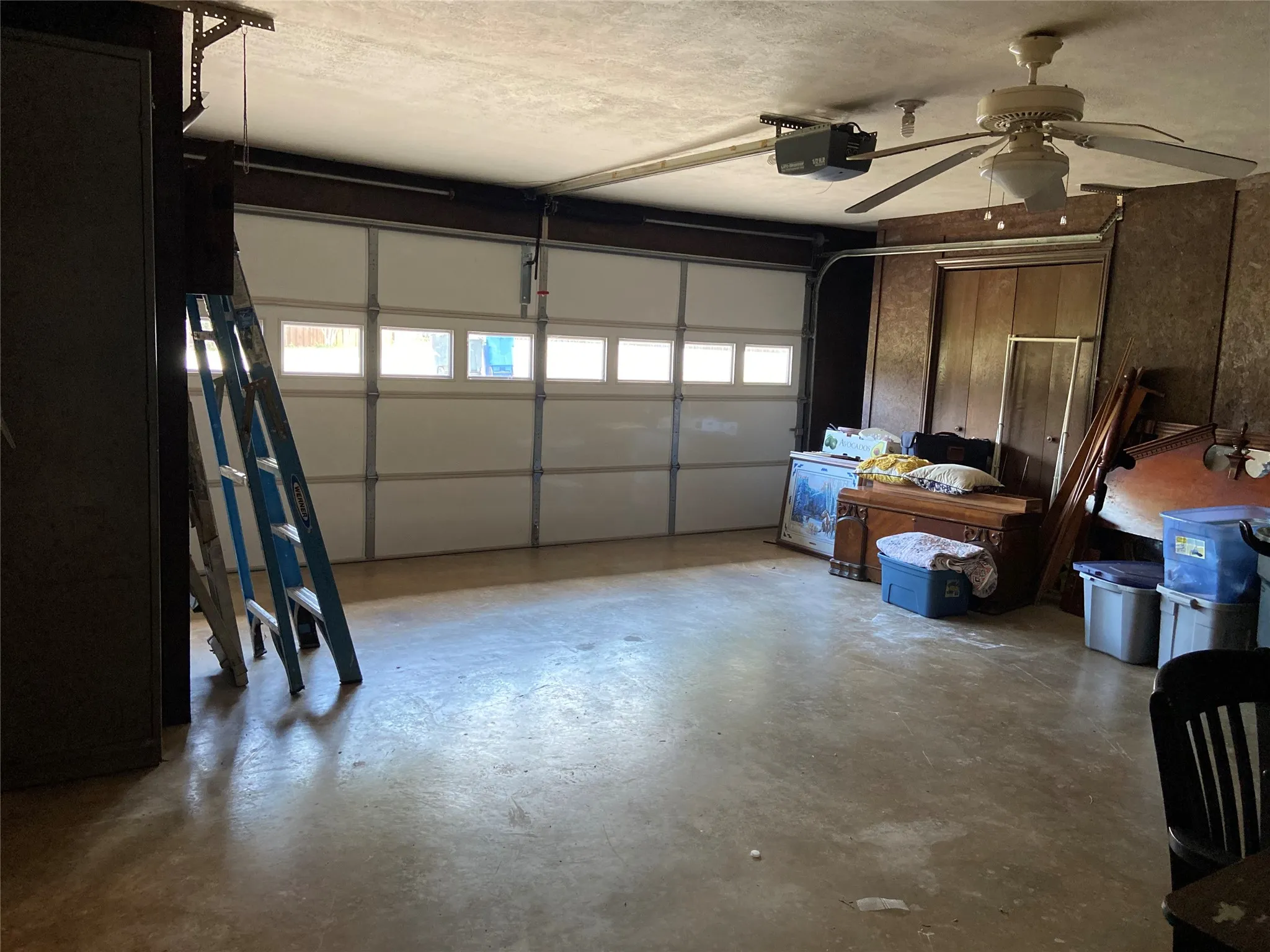 This garage features ample custom storage spaces plus room for 2 cars.
