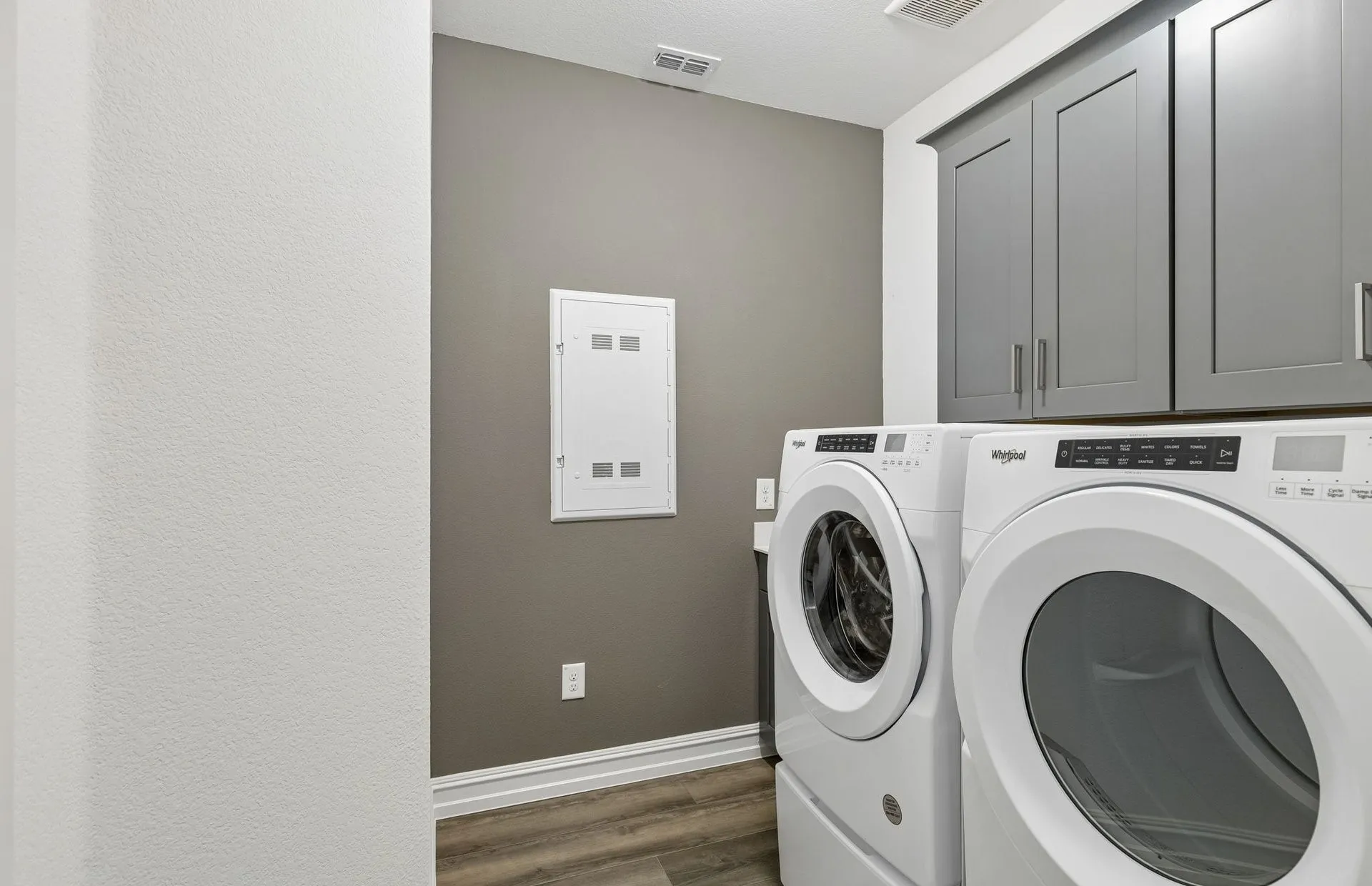 Laundry room with built in shelving