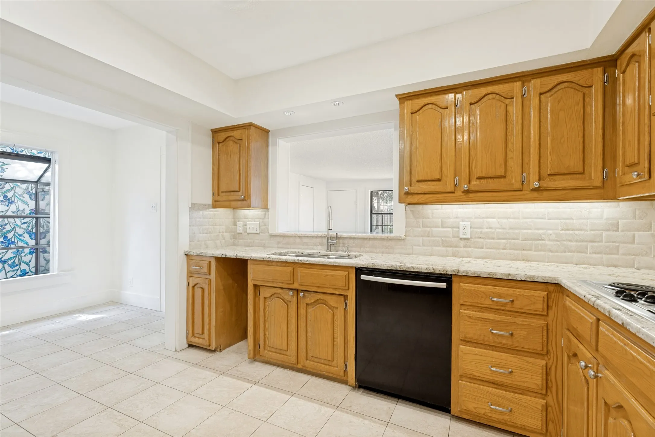 with room for a table and looks into the family room