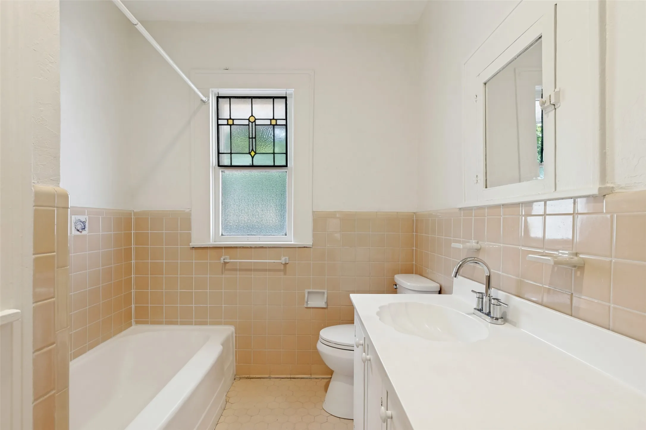 This bathroom serves both secondary bedrooms upstairs and the bonus room