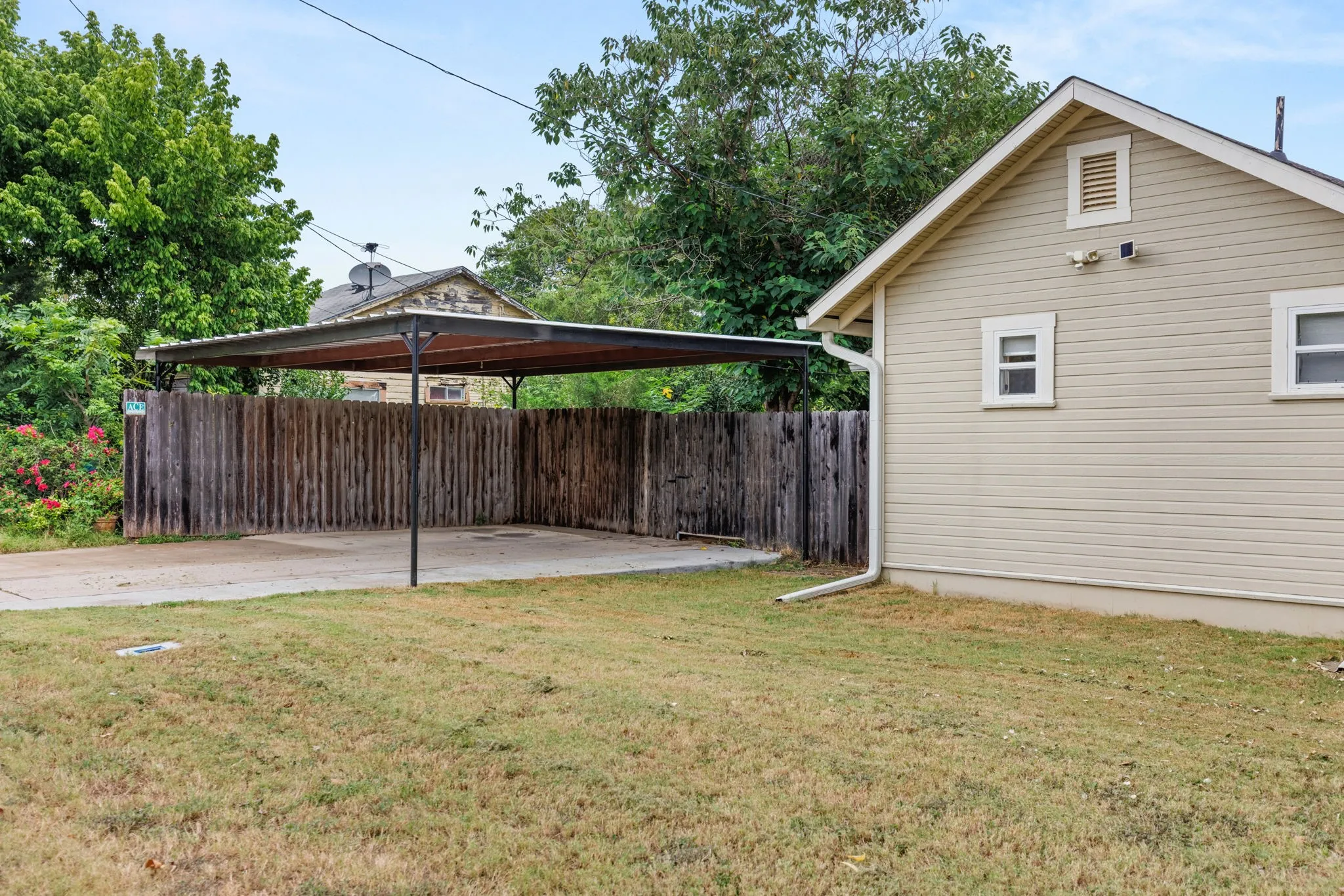 Carport with concrete slab