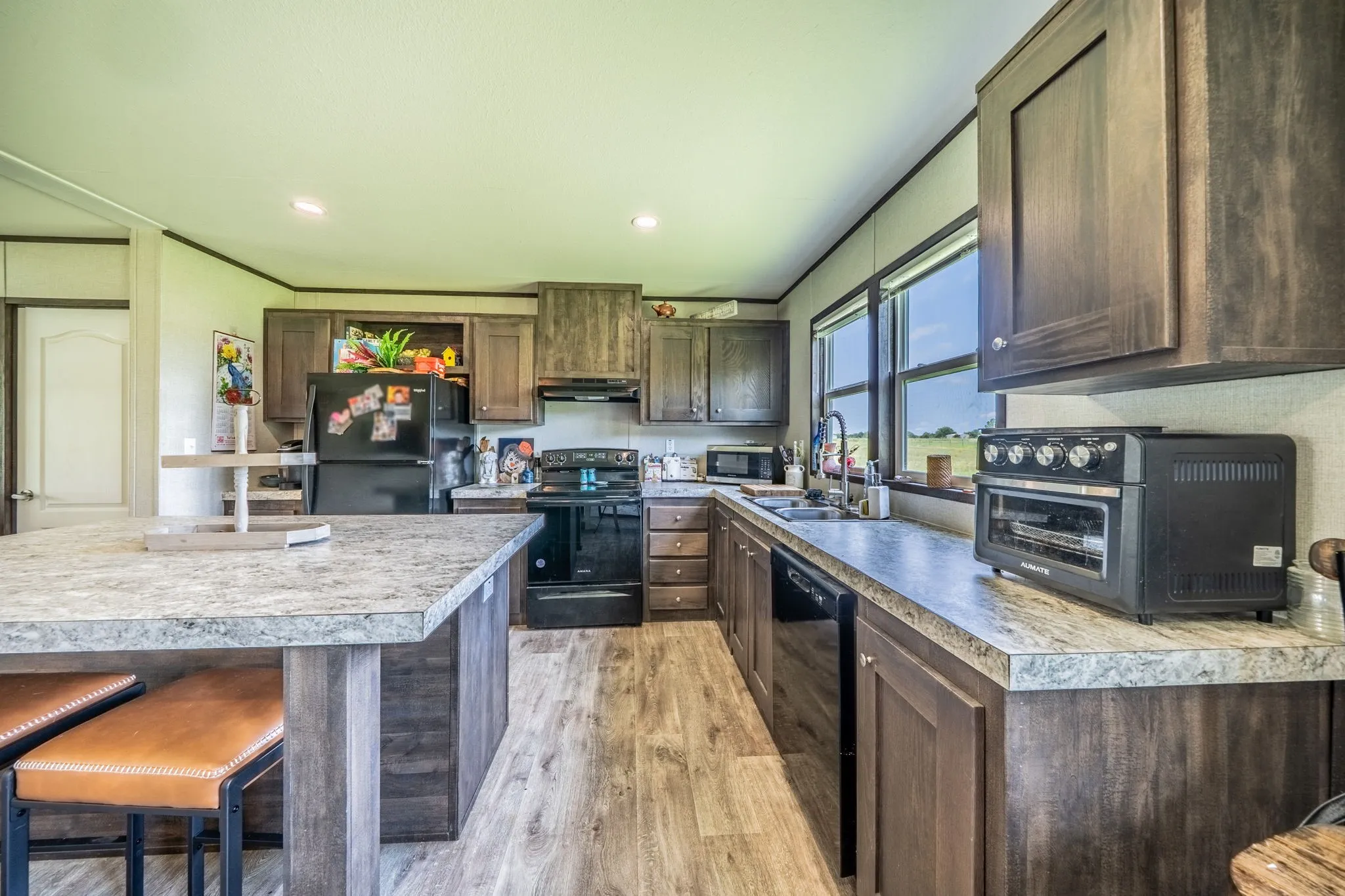 Kitchen with plenty of storage space and large island