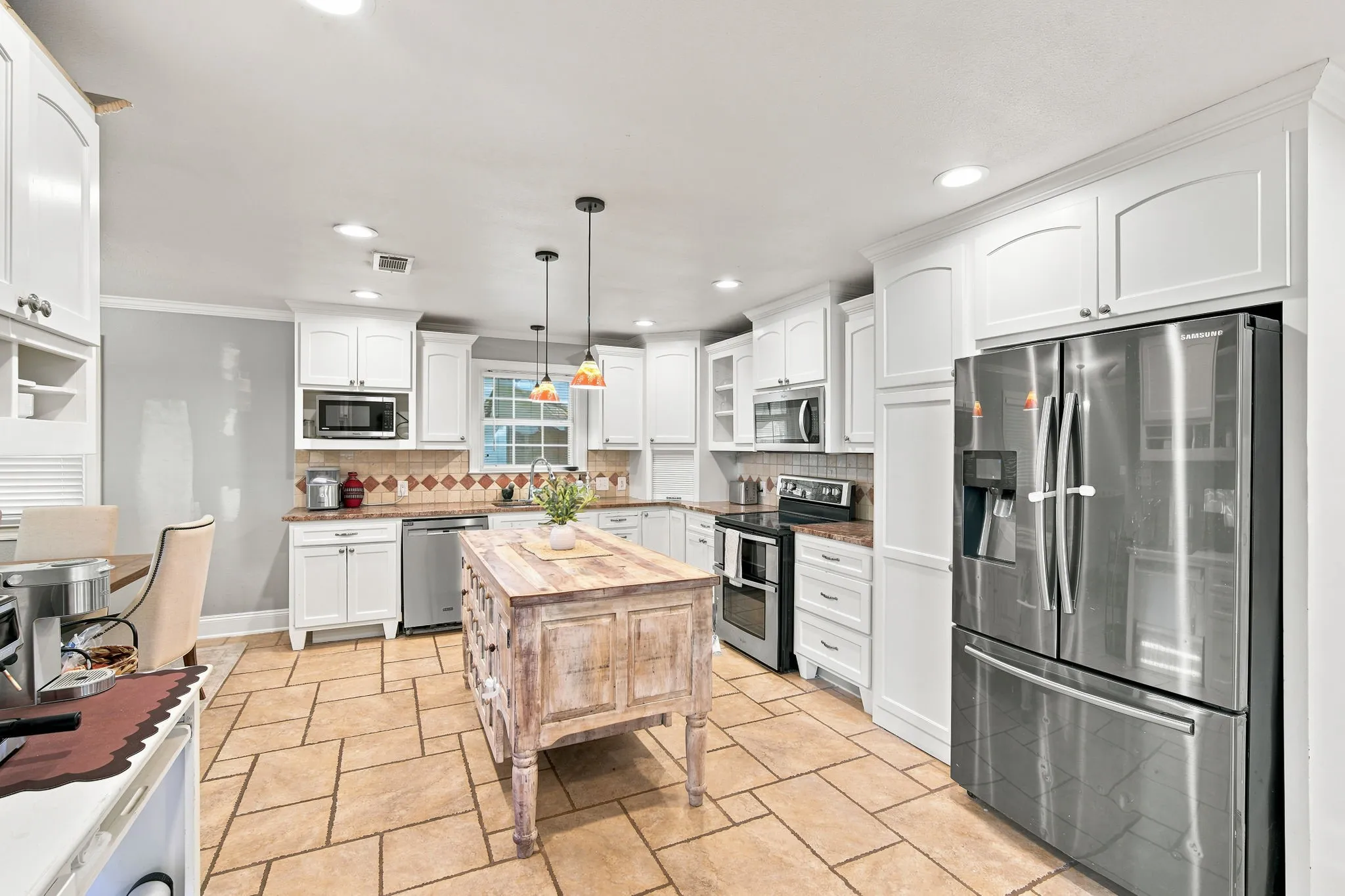 Wonderful open kitchen is great for the cook of the family!