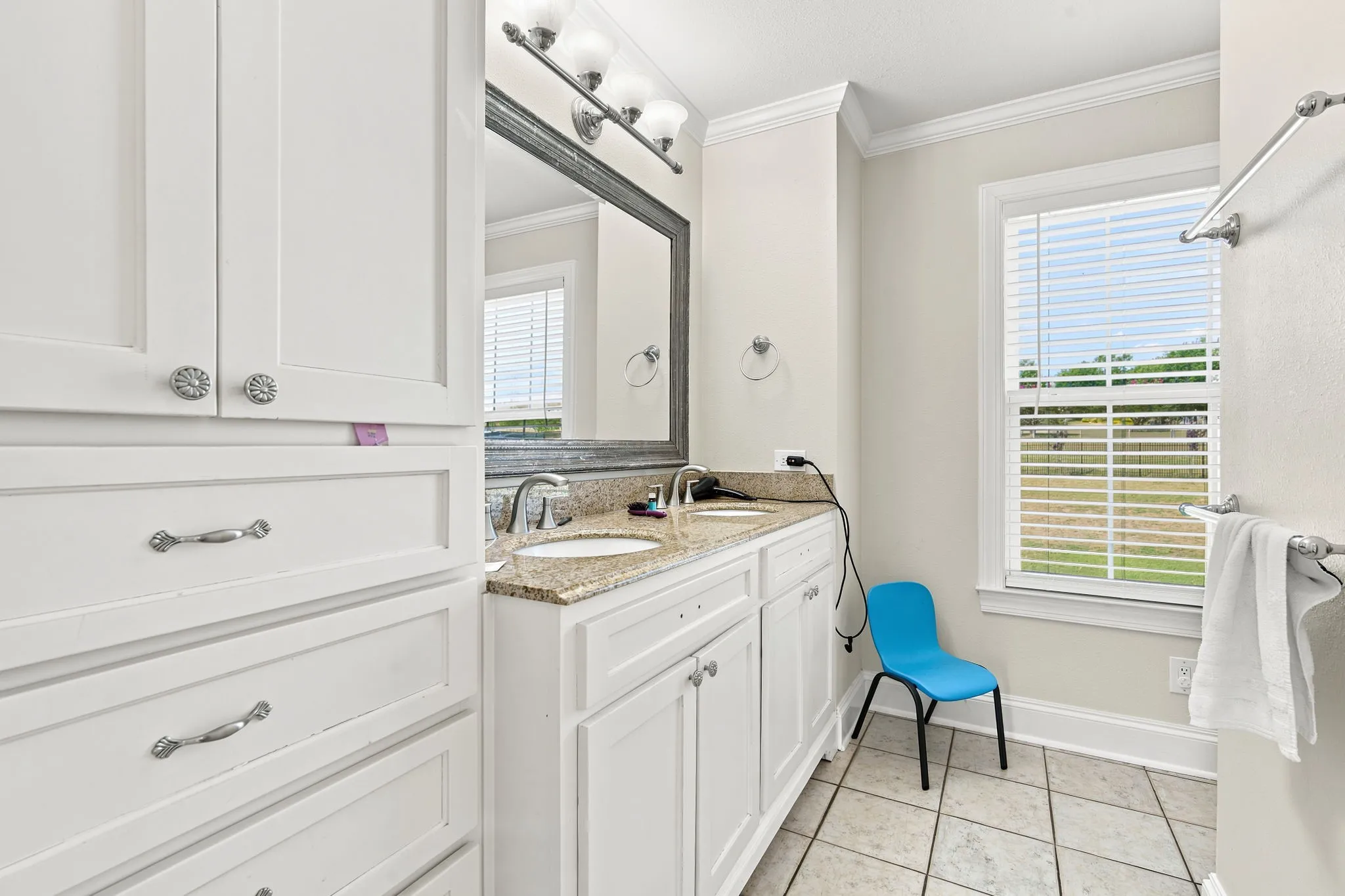 Secondary bathroom with extra cabinet space