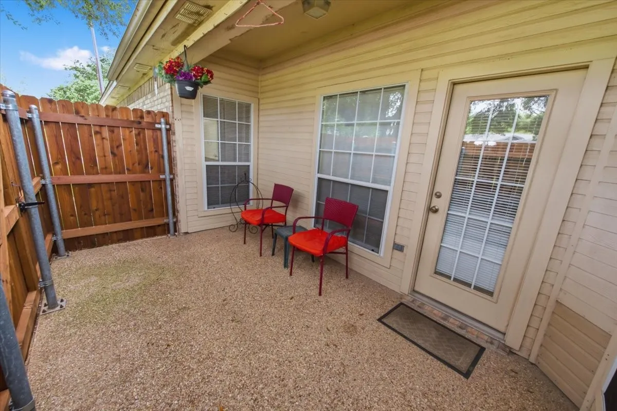 Covered and privacy fenced side patio
