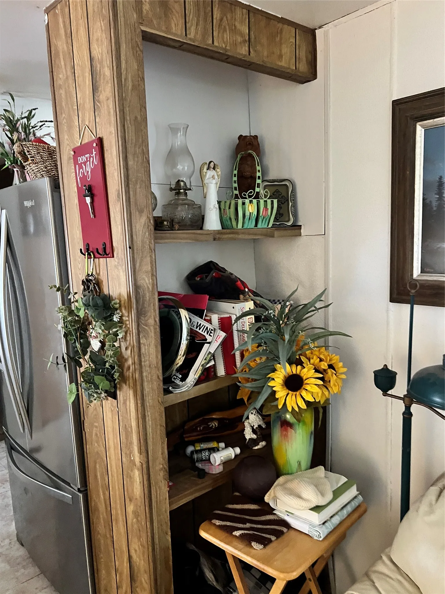 Laundry area with washer and dryer and wooden walls