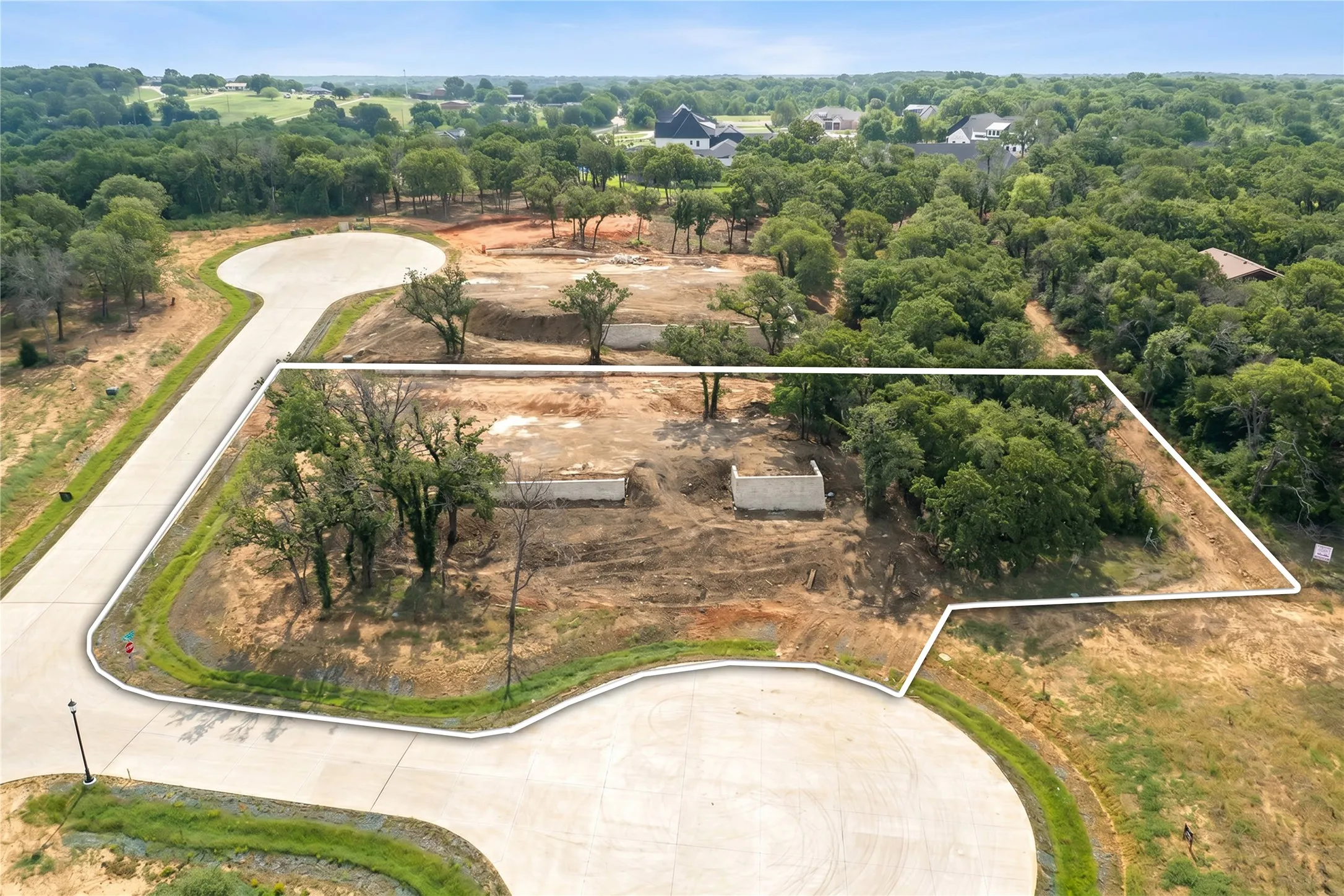 Aerial view of the full one-acre corner lot in 1830 Place, minutes from Flower Mound and Highland Village