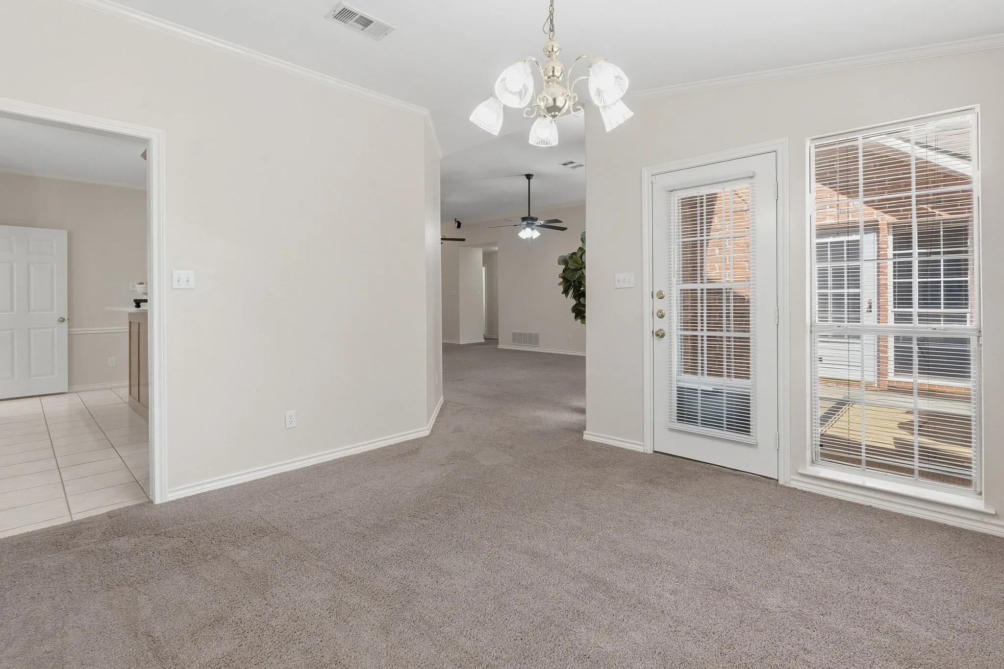 The dining room includes beautiful built-ins and could also function as a second living area, den, game room, craft room, or home office.