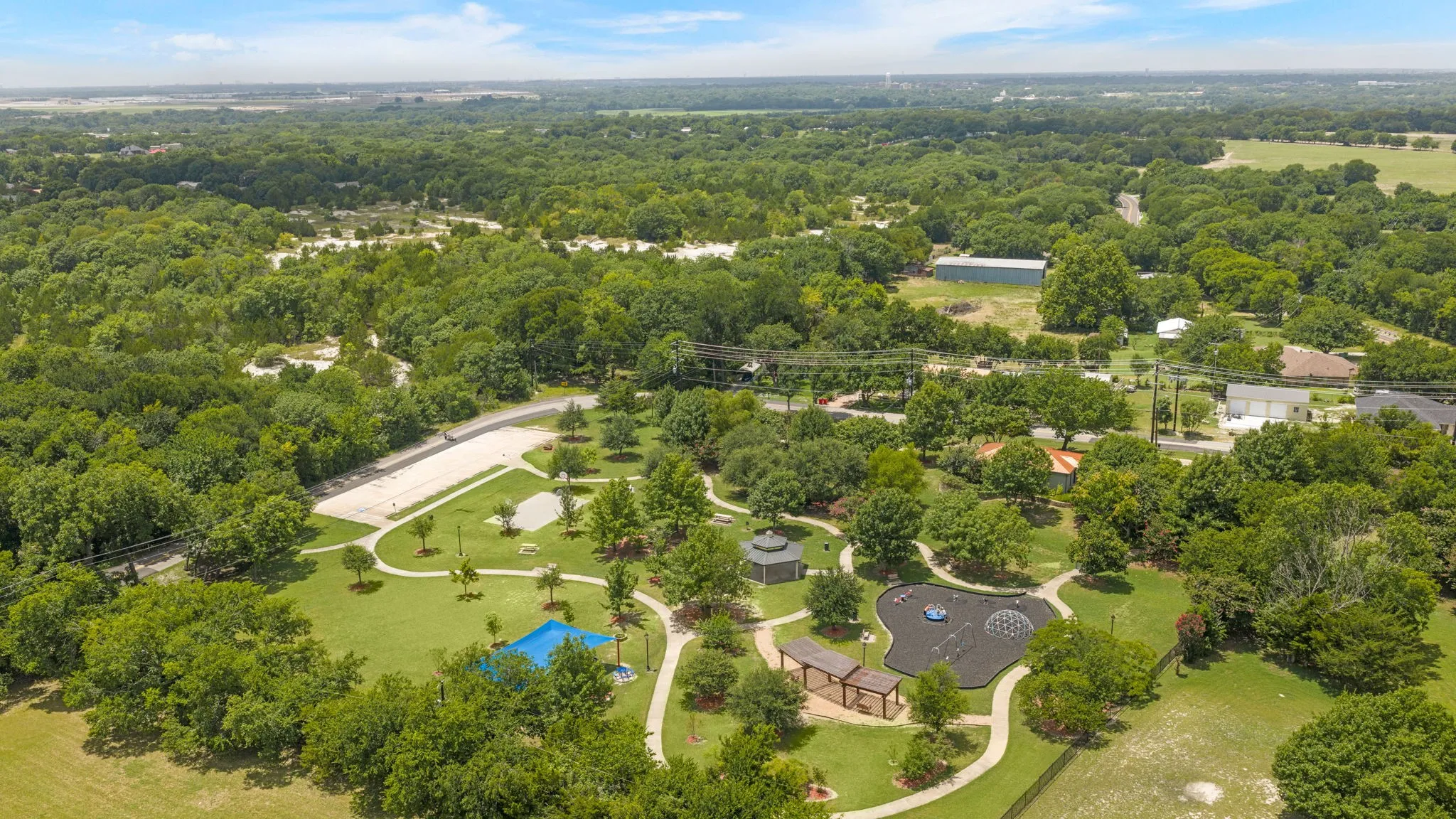 Pat Fowler Town Park with walking paths, playgrounds, picnic areas, and outdoor fun.