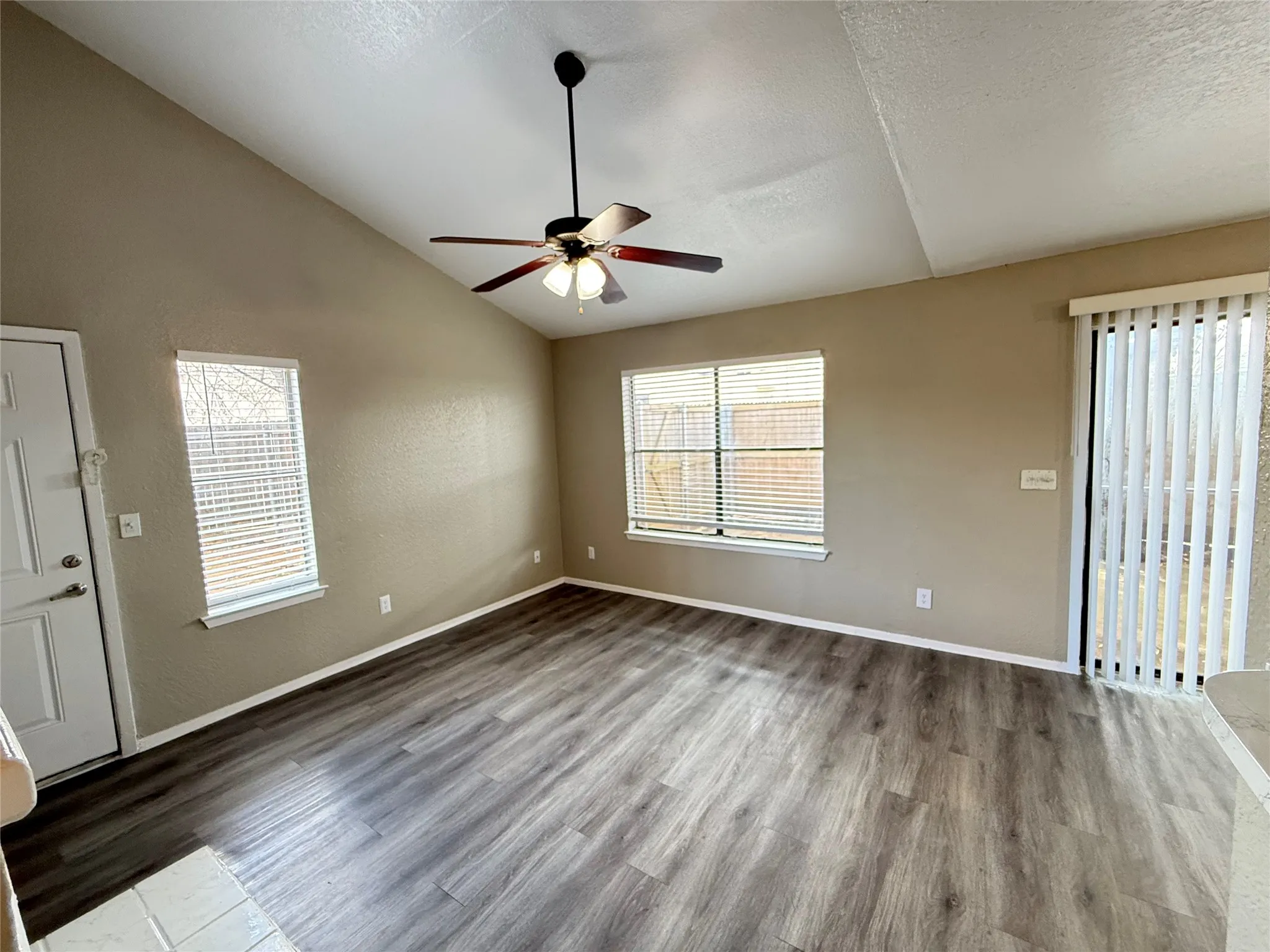 Large vaulted ceilings make the room feel large and spacious.