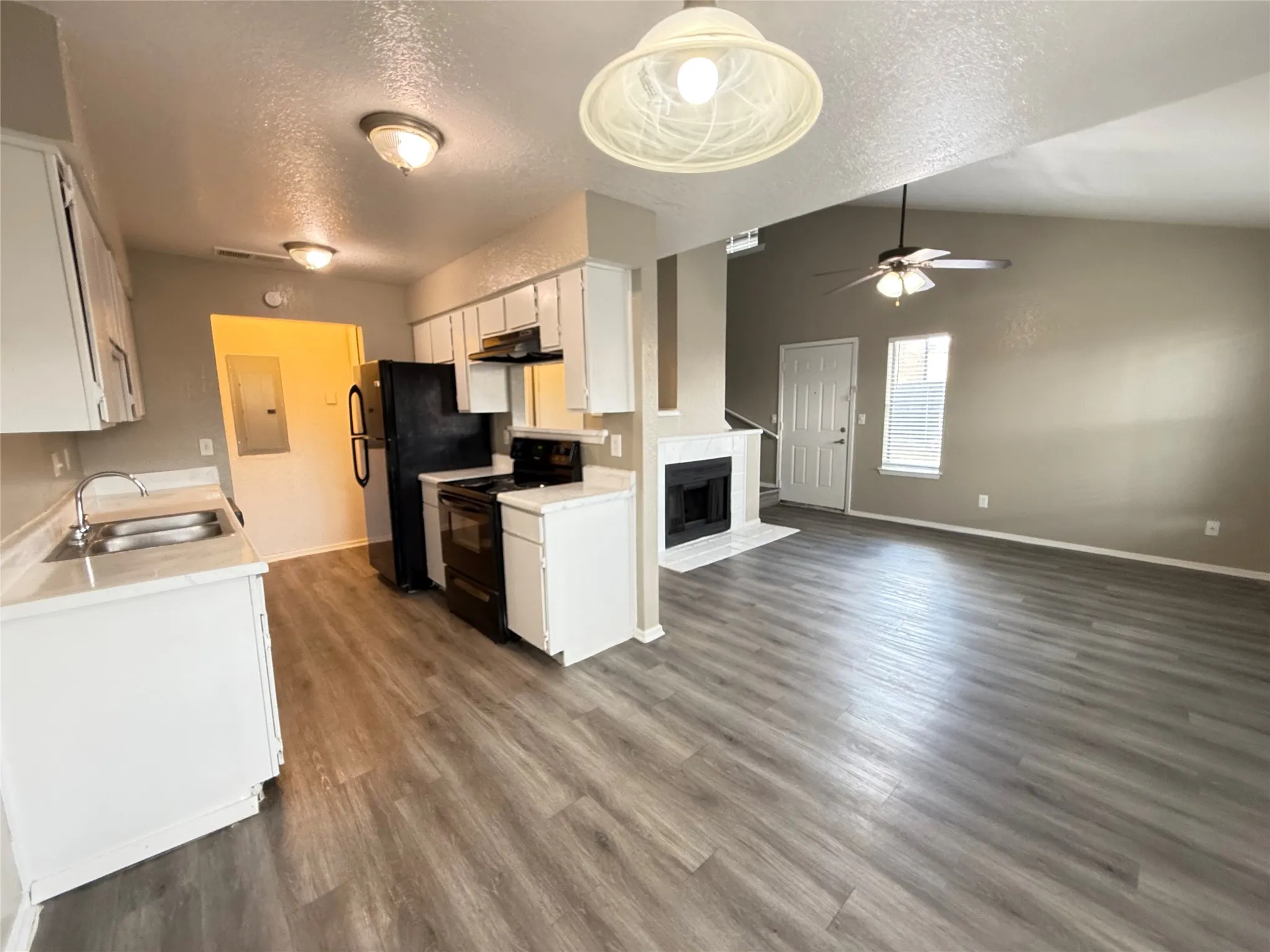 Dining area with attached kitchen.