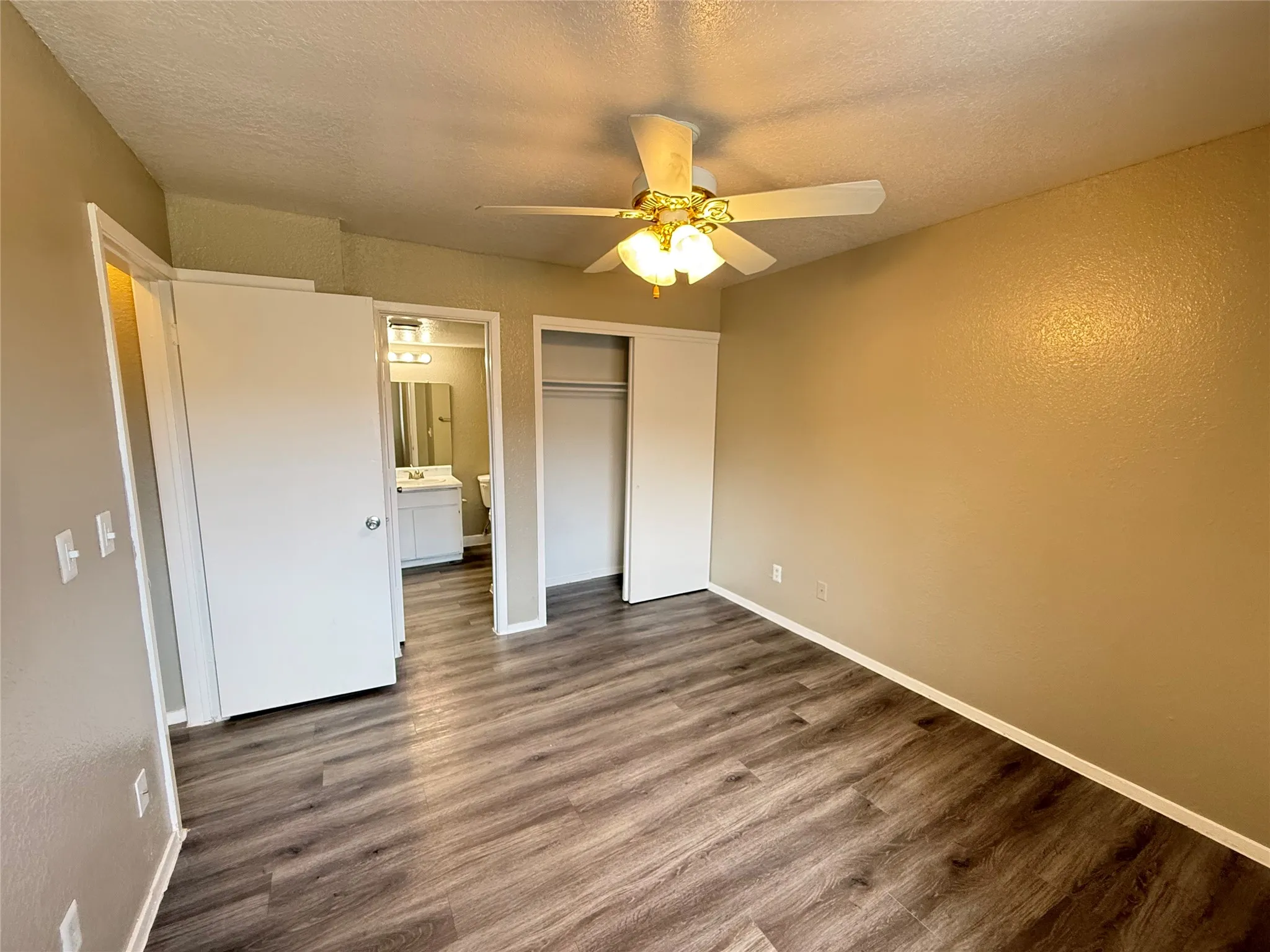 primary suite with attached bathroom.