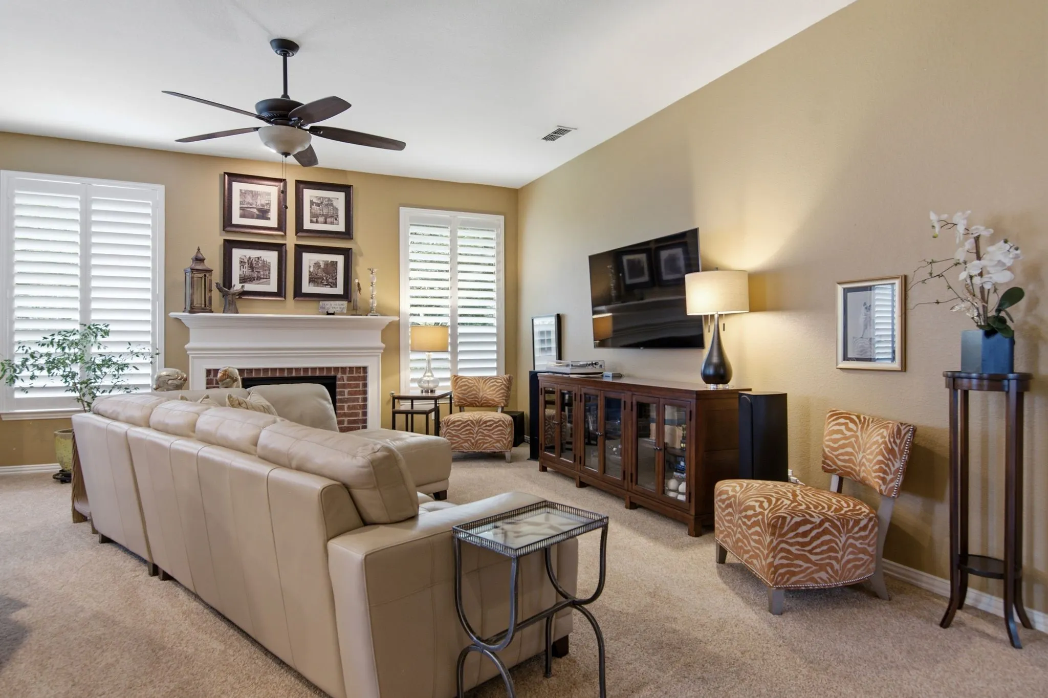 The open and spacious family room seamlessly connects to the kitchen and breakfast area.