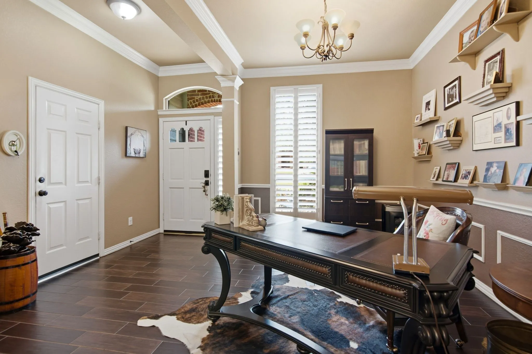 This room is currently being used as an office space, but would make a great formal dining area.