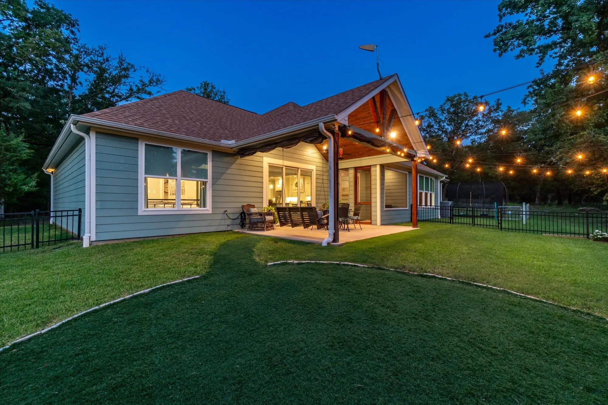 View of the open covered back patio.  To the right is the screened in porch.