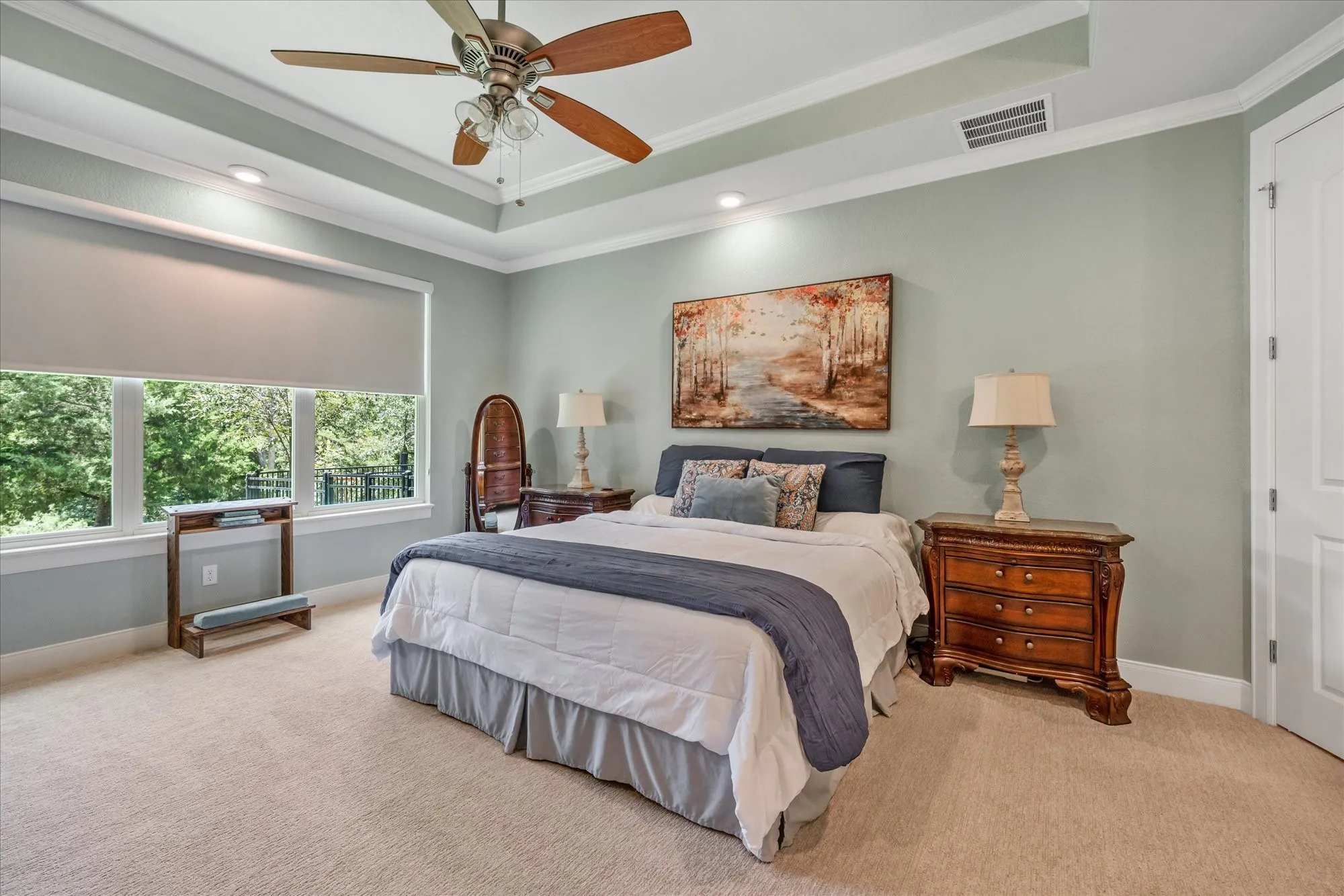 Wake up to gorgeous views and nature.  Custom shades throughout the house.  Tray ceiling and 8" floor moulding throughout.
