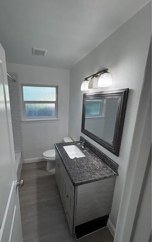 2nd Bathroom in Hallway - These photos are from a previous listing. House is Tenant occupied.