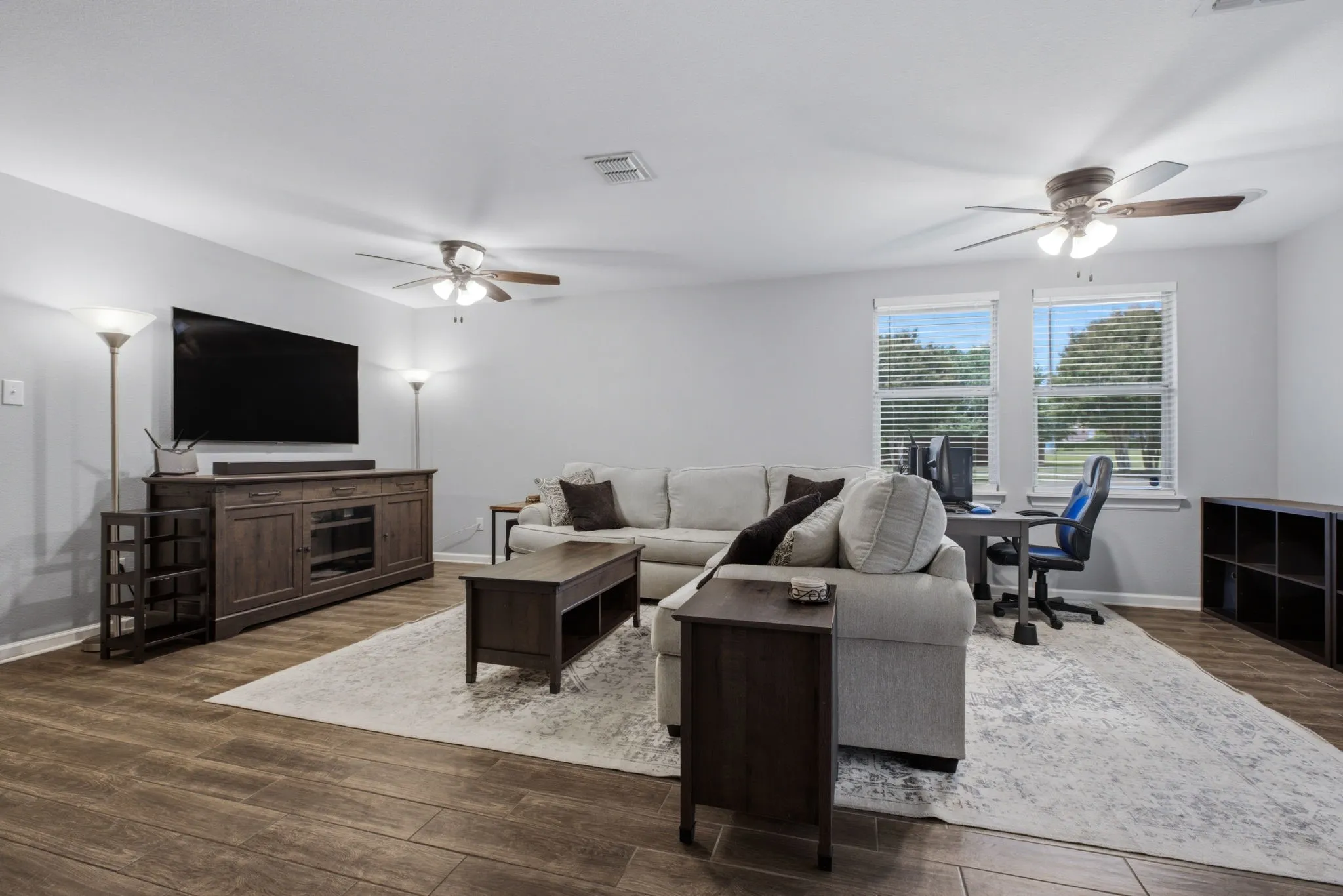 Extended living room with beautiful natural light.