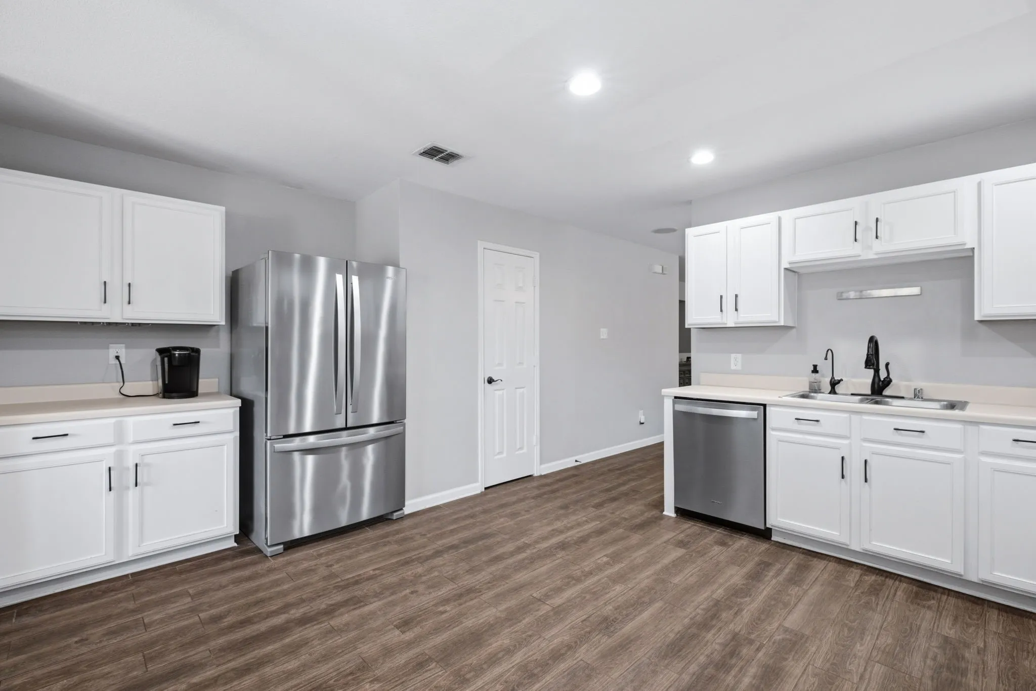 Tons of storage in cabinets and pantry
