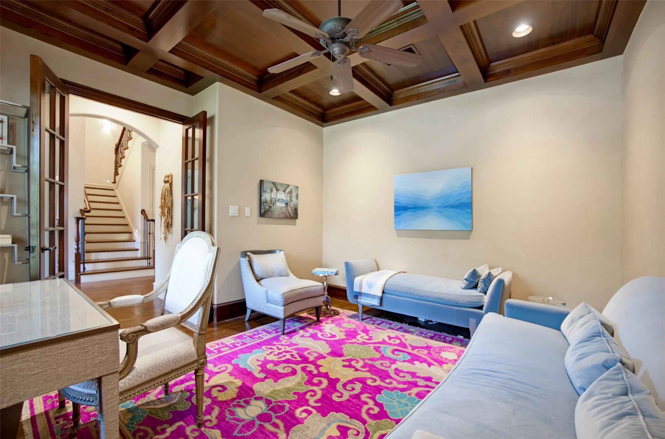 Study/Office or sitting area with coffered wood ceiling.