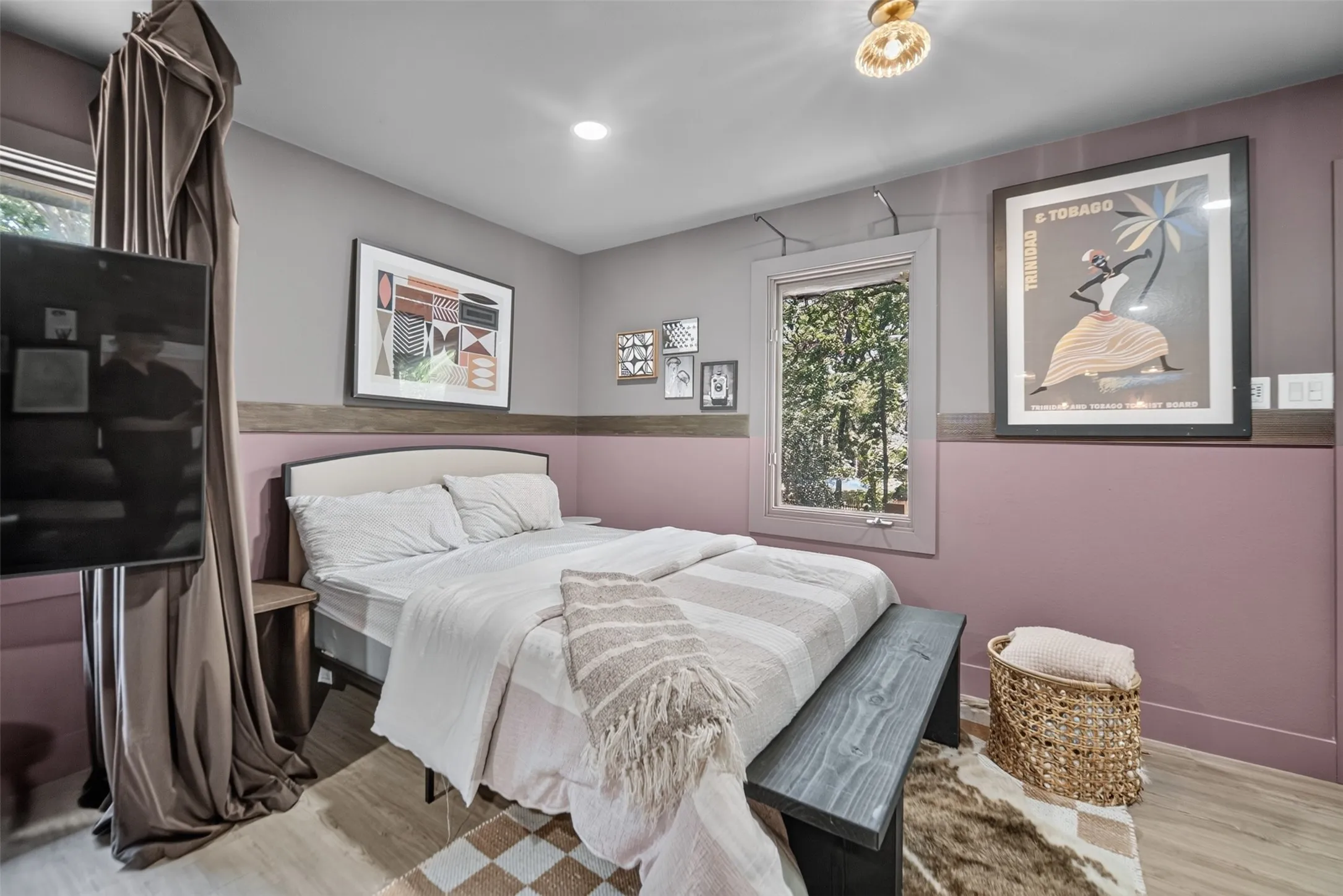 Interior space featuring dual-tone walls with a dark wood-finish accent band