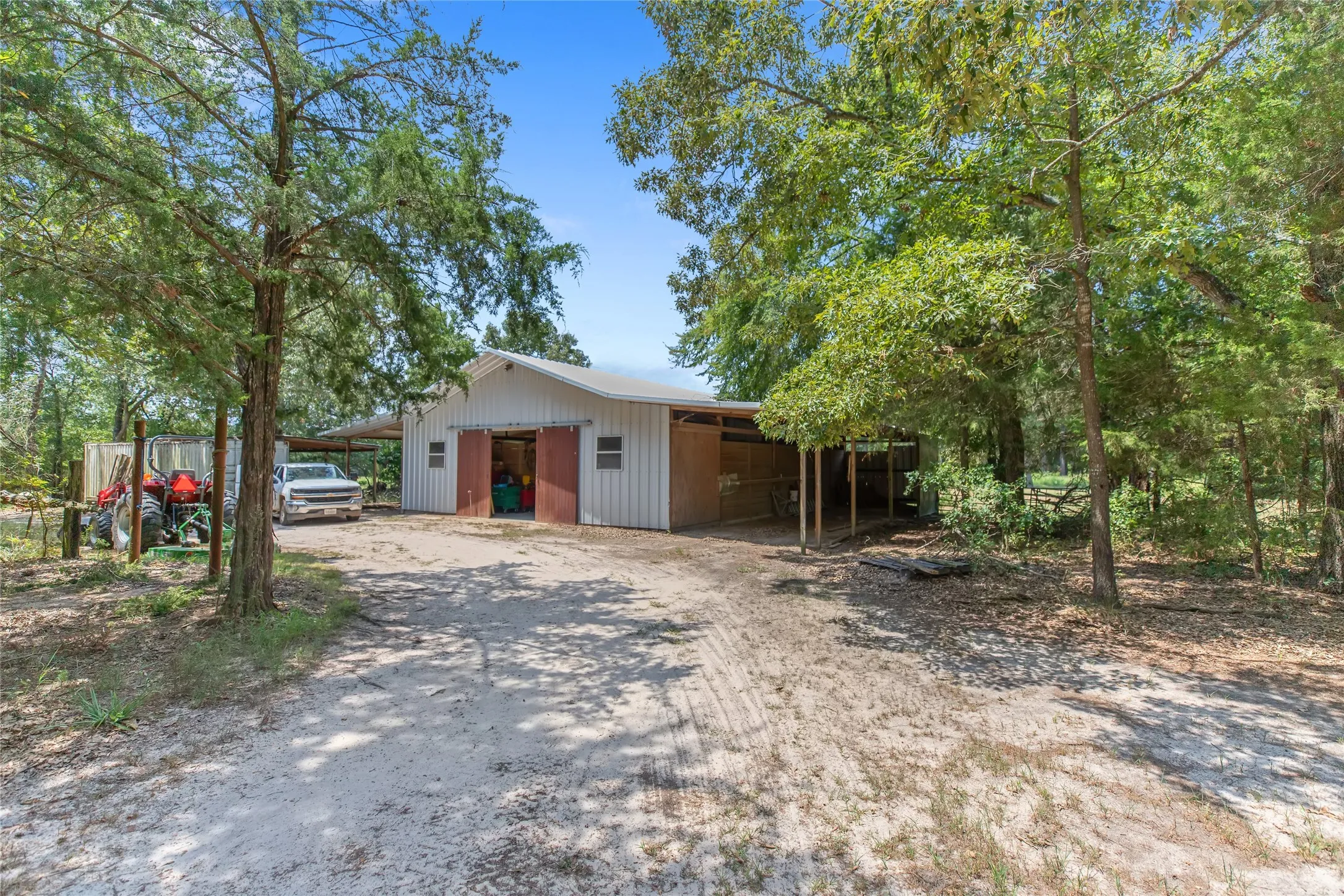 Exterior path leading to the professional horse barn on the Winnsboro Texas estate.