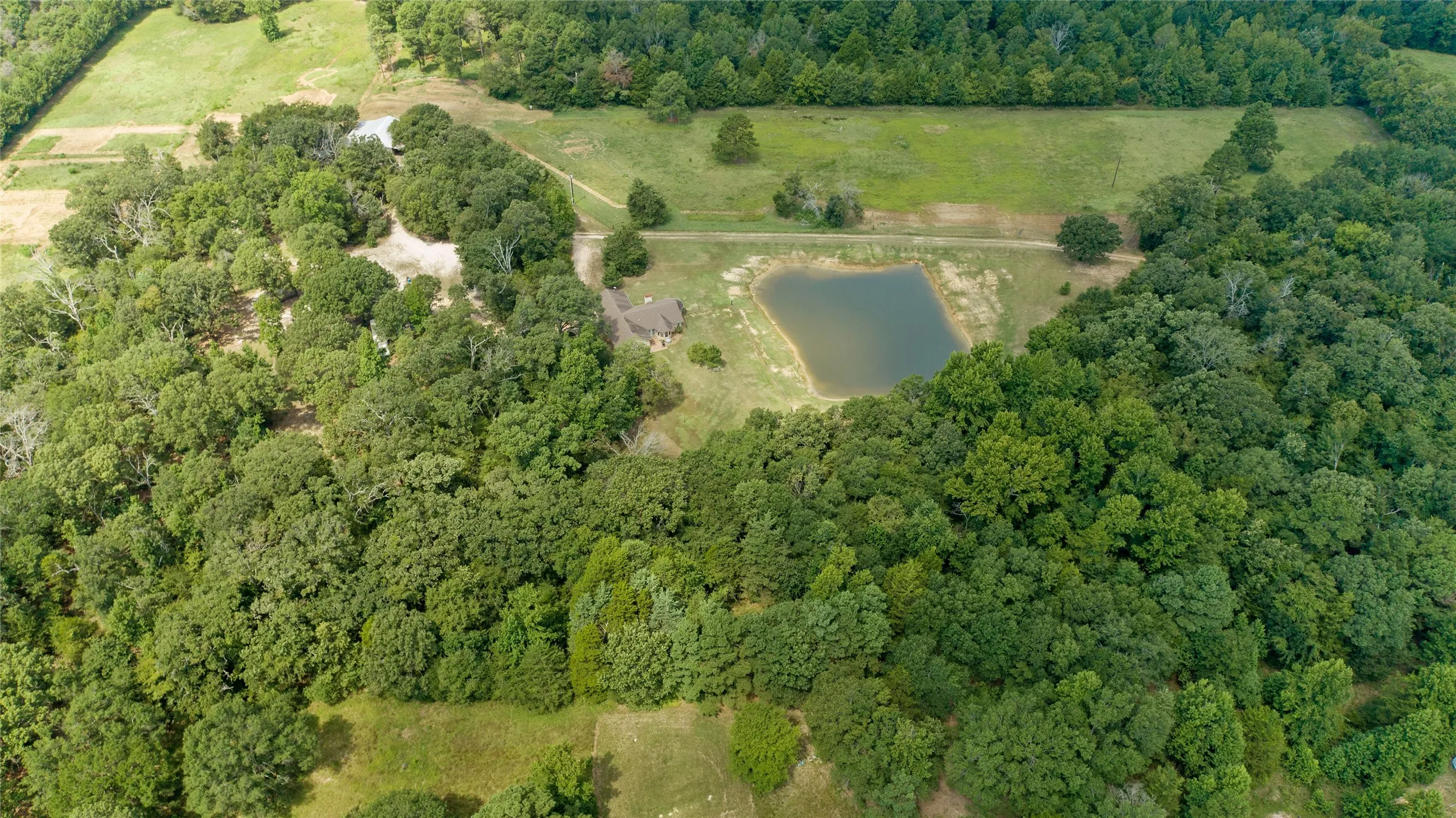 High altitude drone view mapping out the 24.8 acres of prime sandy loam soil fields.