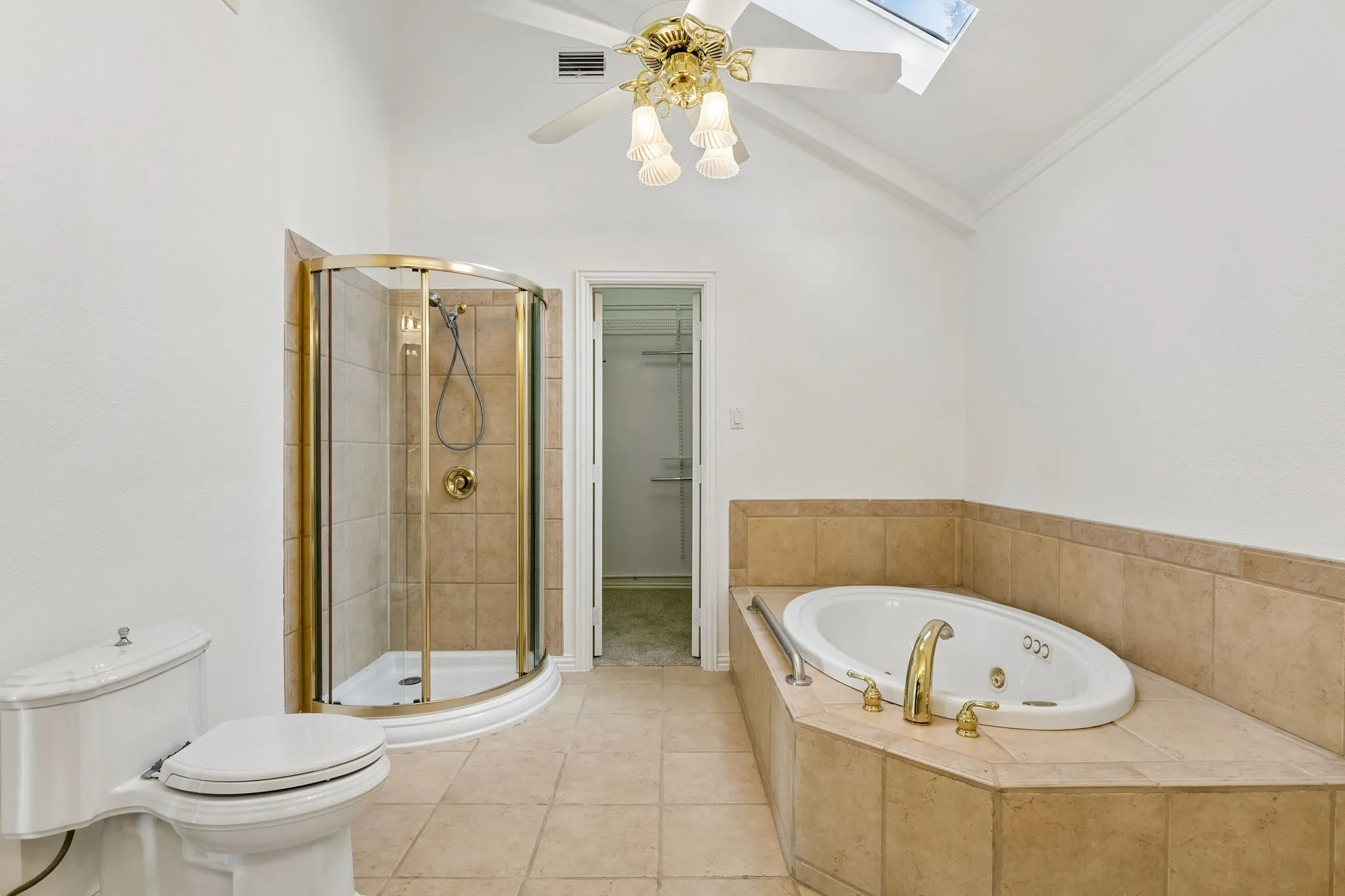 Primary bath with large walk-in closet