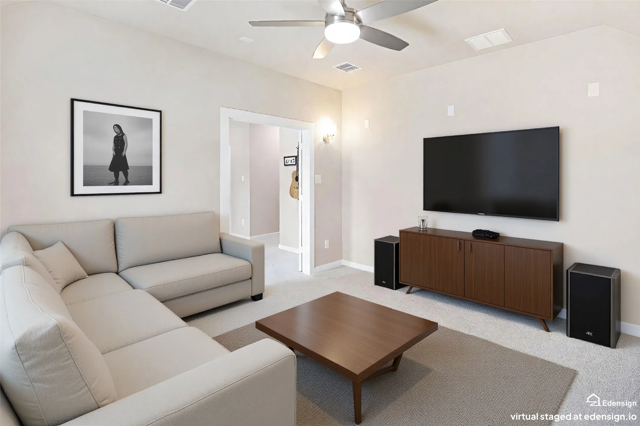 Neutral-toned walls complement the carpeted flooring