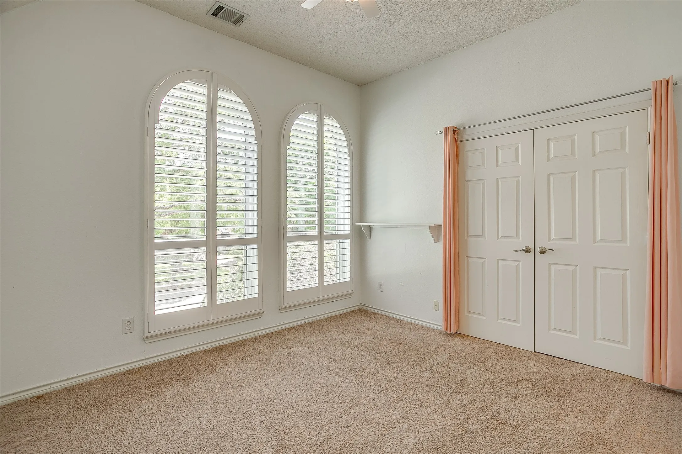 One of three secondary bedrooms upstairs.