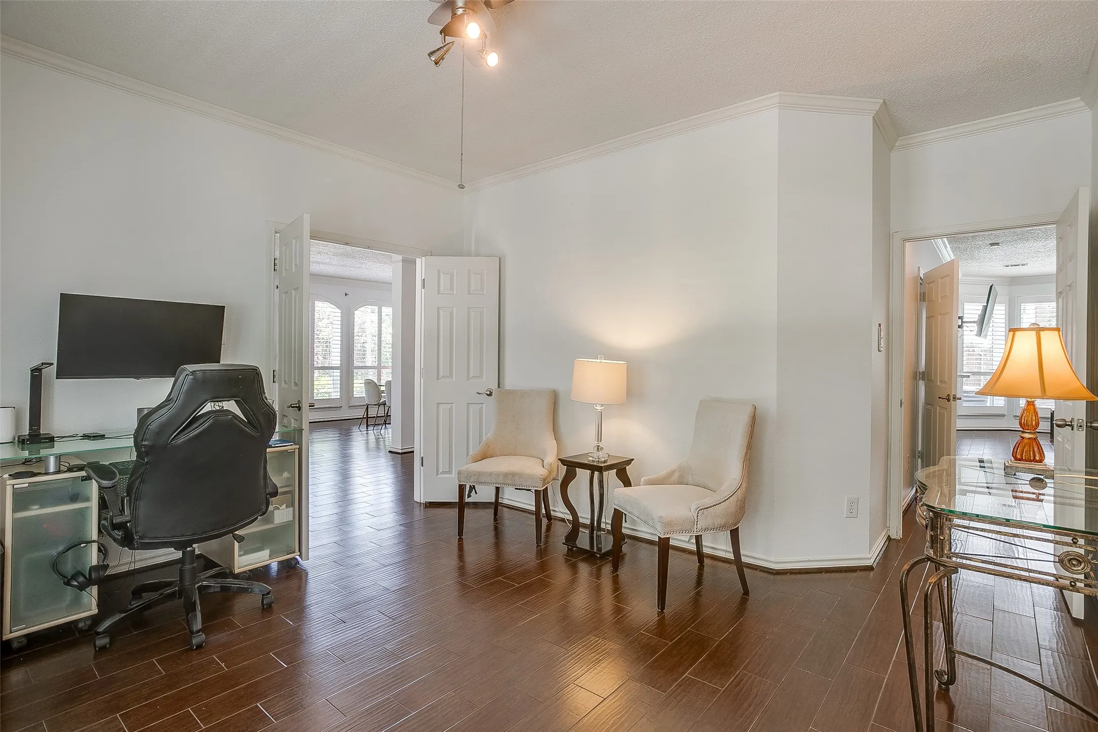 Access your new office with the french doors off of the entry or the private door by the primary suite.