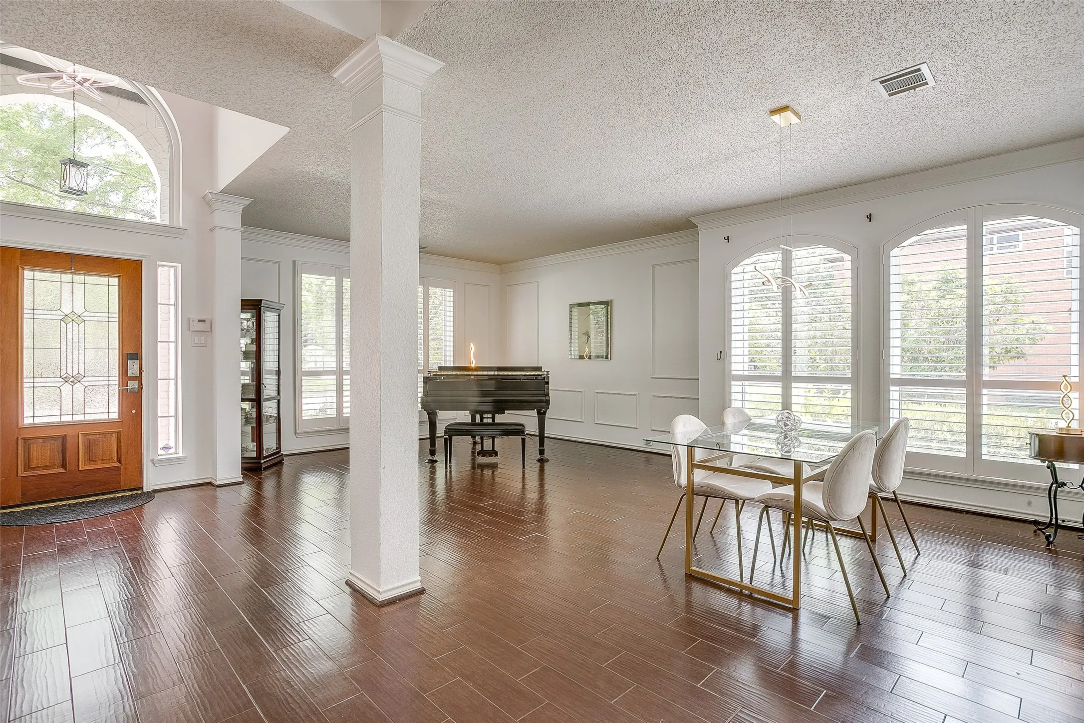 Your new home is framed and finished with plantation shutters, thick baseboards, and crown molding.